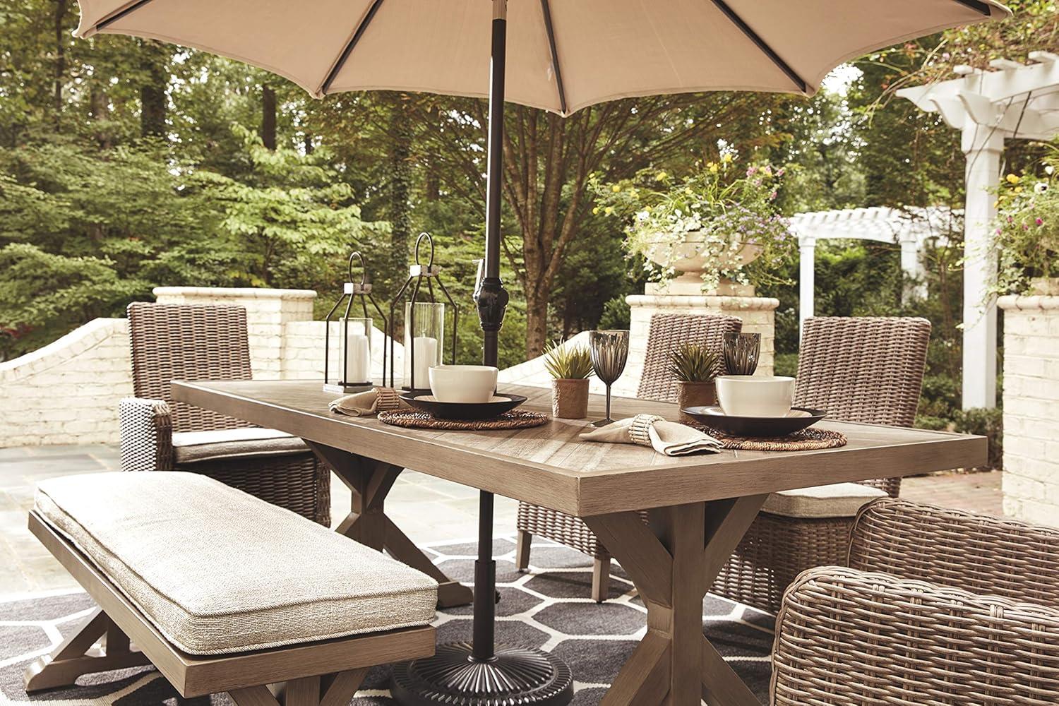 Signature Design by Ashley Beachcroft Trestle Patio Dining Table in Beige