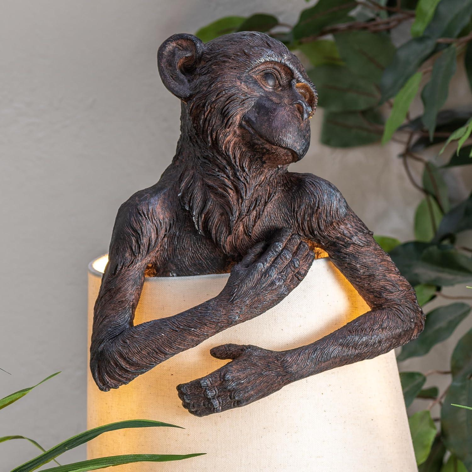 21.5" Chester Monkey Bronze Resin Table Lamp w/ Oatmeal Shade