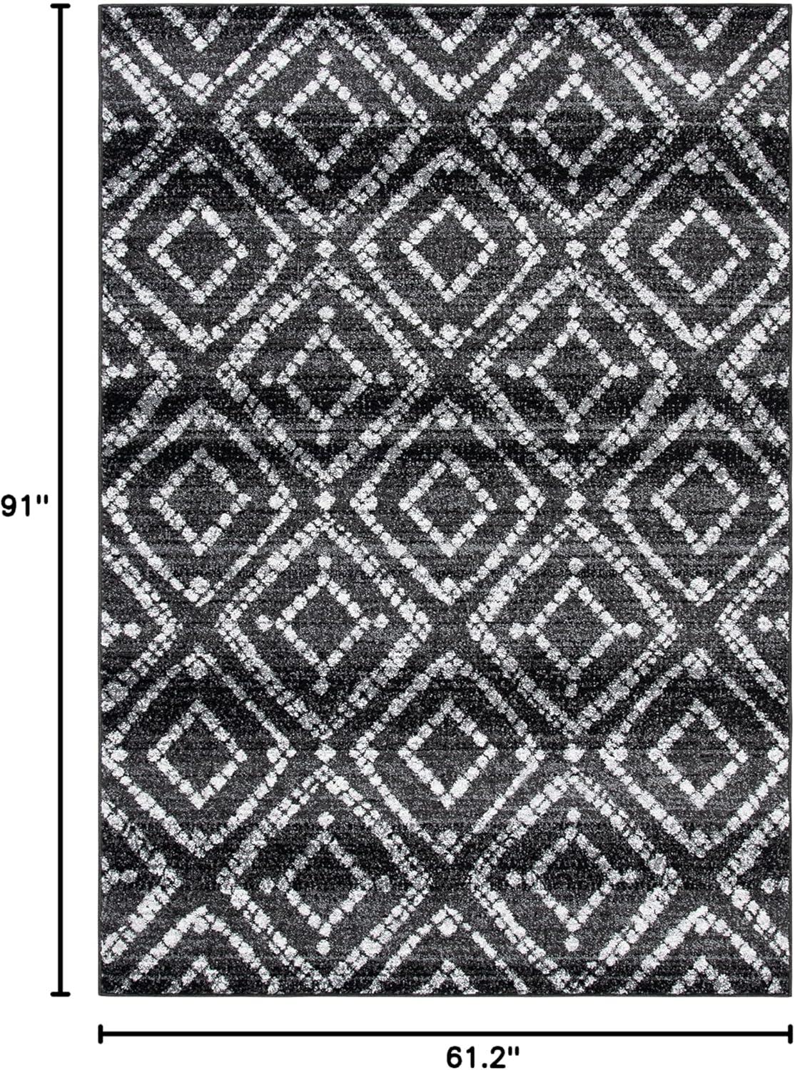 Black and Ivory Geometric Synthetic Rectangular Area Rug