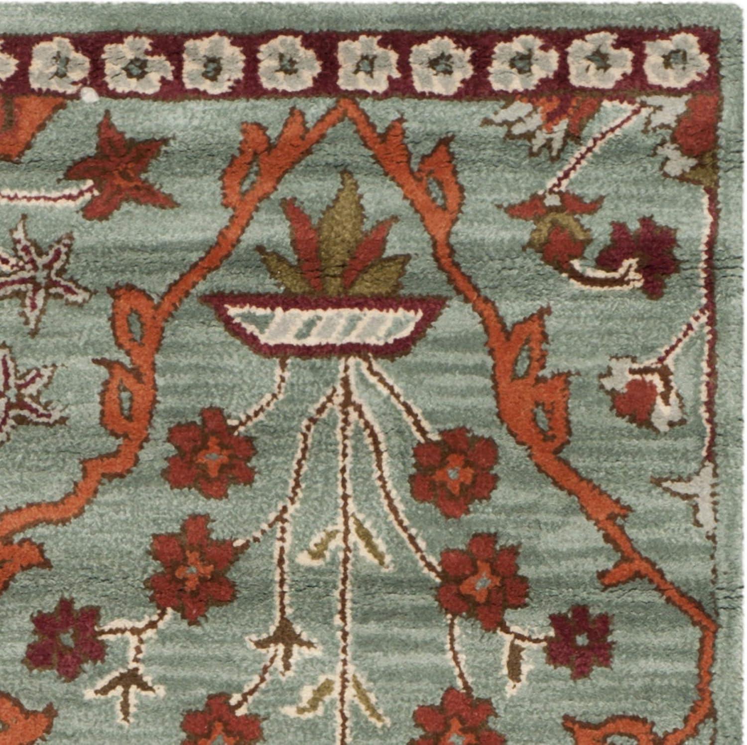 Wyndham WYD206 Hand Tufted Area Rug - Blue/Rust - 5'x8' - Safavieh.