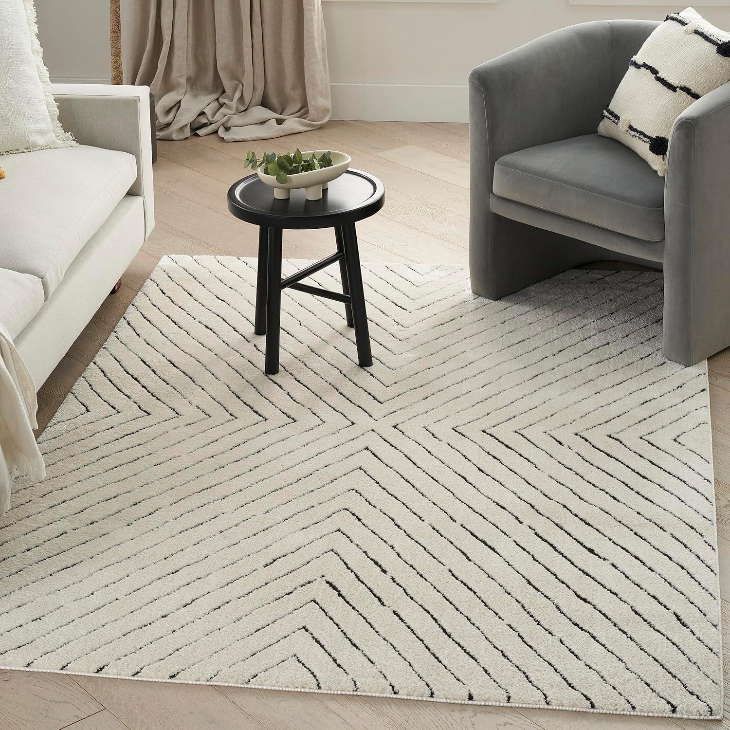 Ivory Black Abstract 8' x 10' Synthetic Area Rug