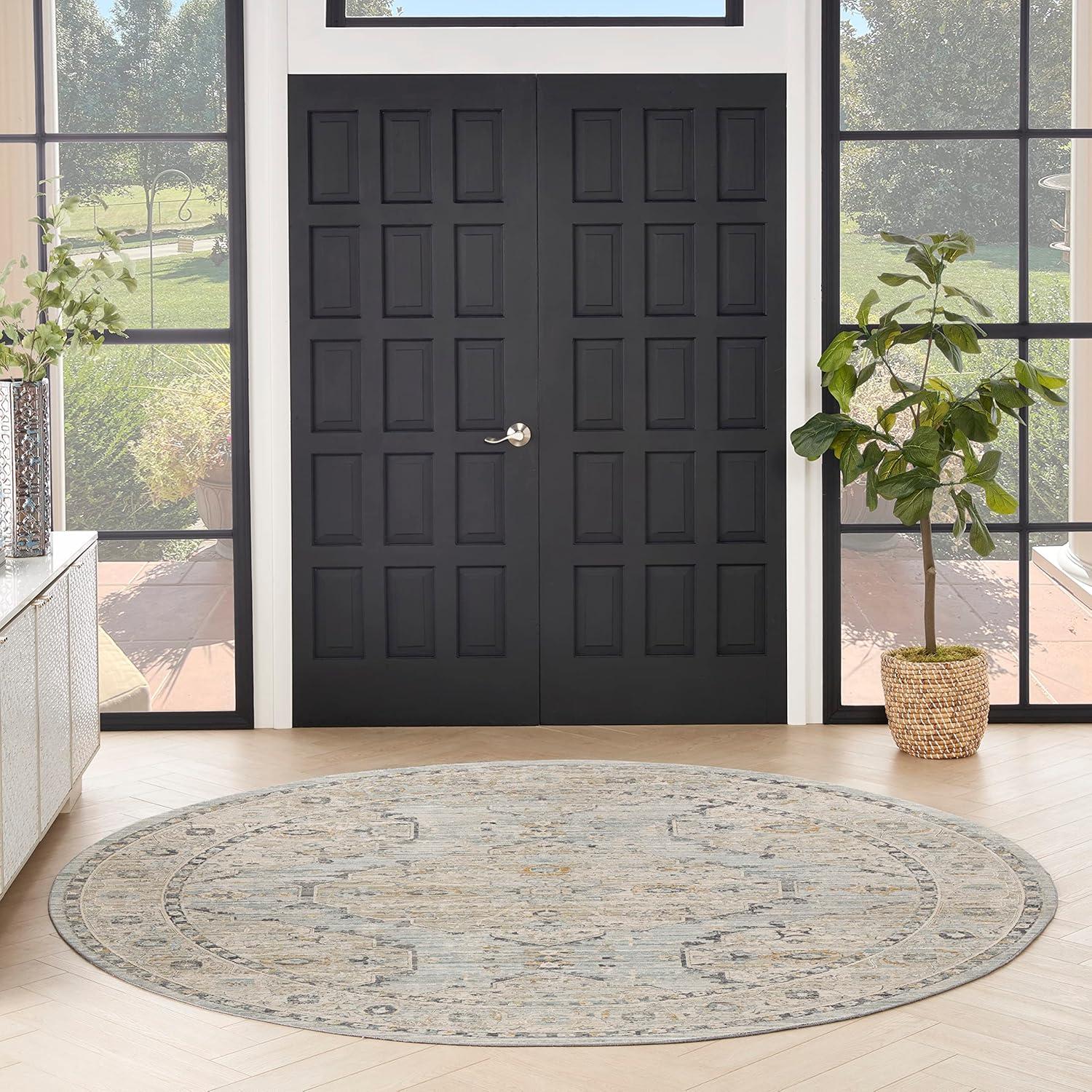 Nyle Light Blue and Beige Round Synthetic Area Rug