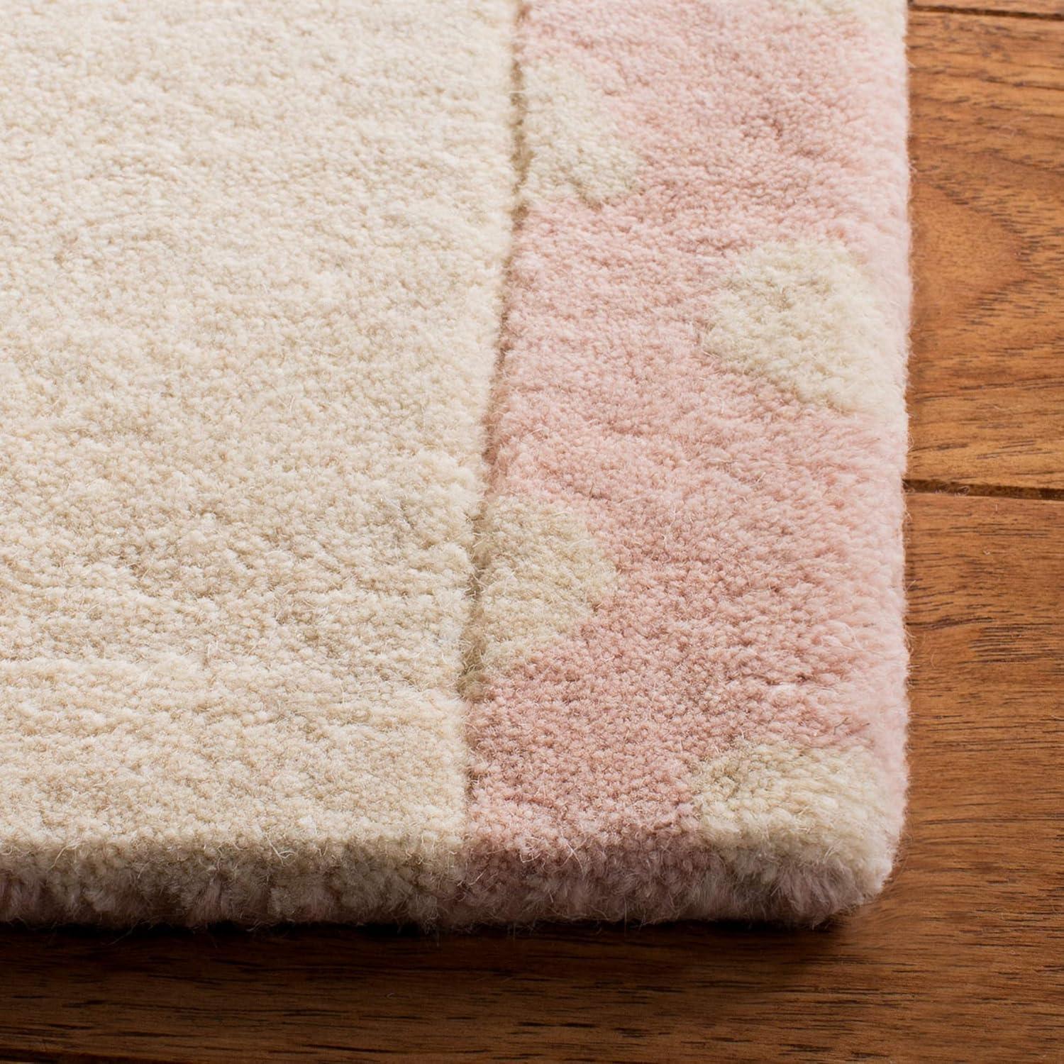 Safavieh Kids SFK922 Hand Tufted Area Rug - Pink/Ivory - 8'x10' - Safavieh.