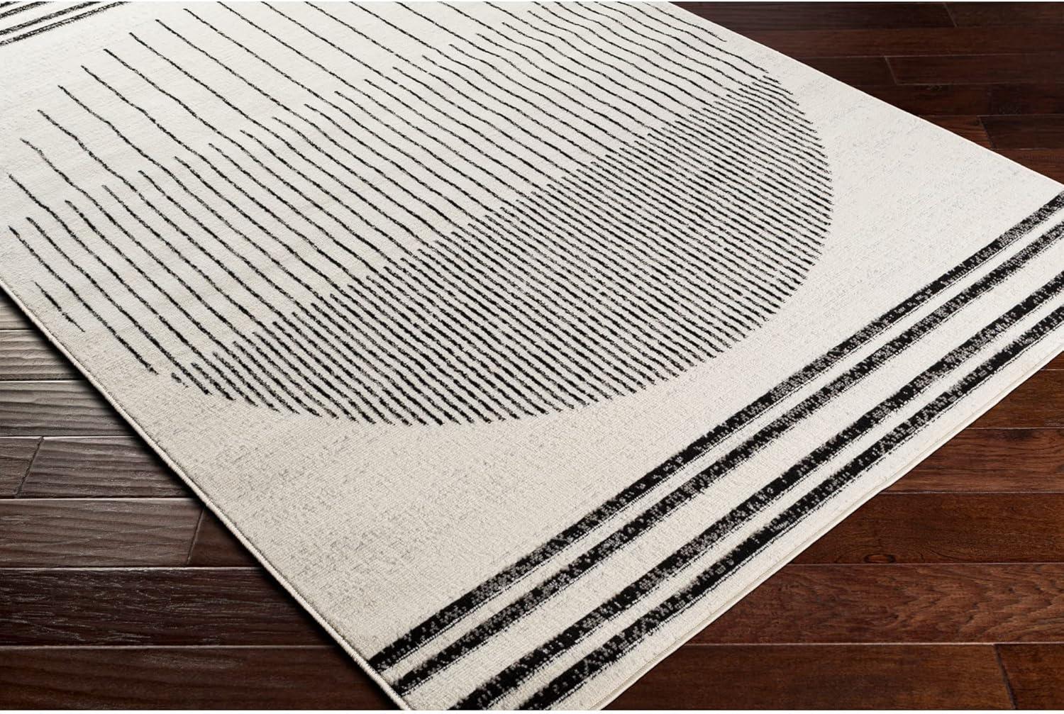 Penrod Black and Ivory Geometric 5' x 7' Area Rug