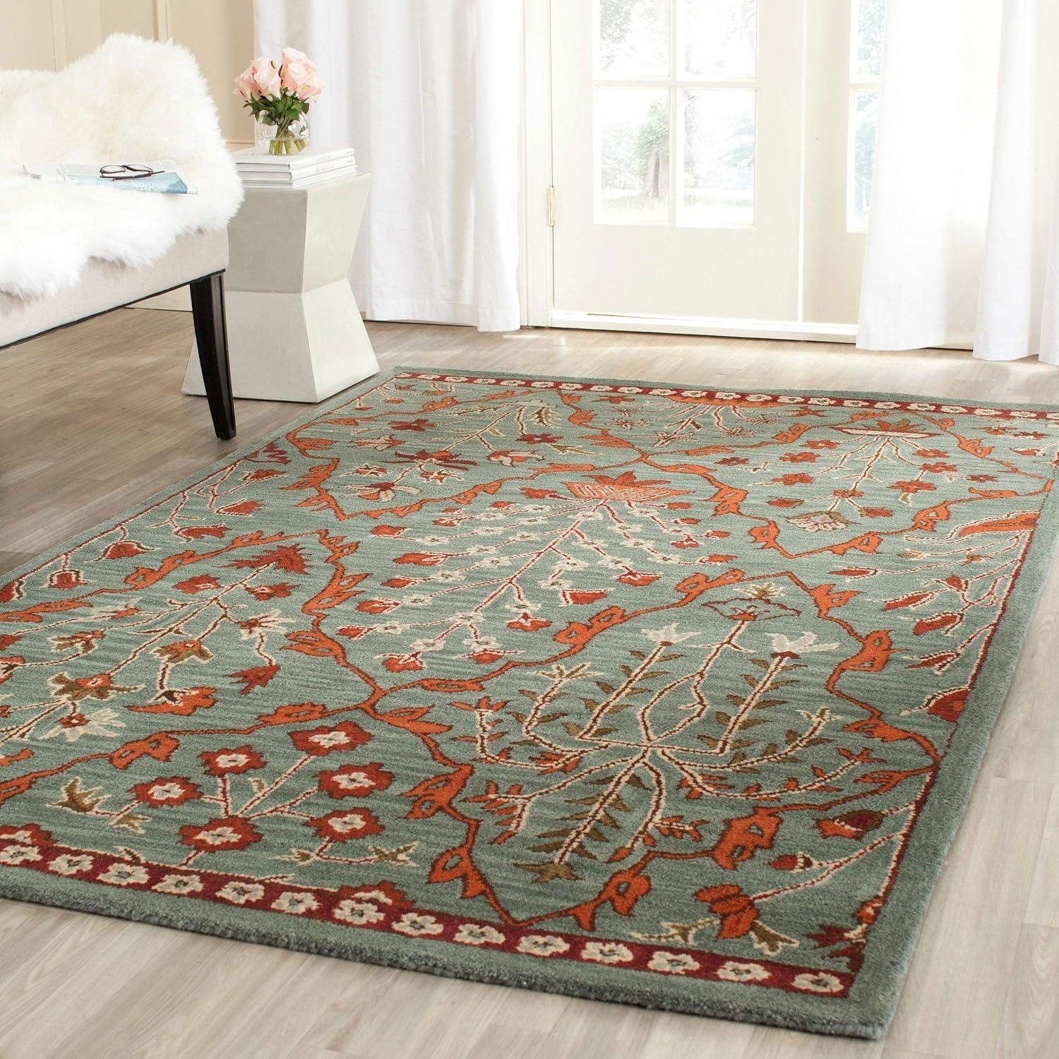Wyndham WYD206 Hand Tufted Area Rug - Blue/Rust - 5'x8' - Safavieh.