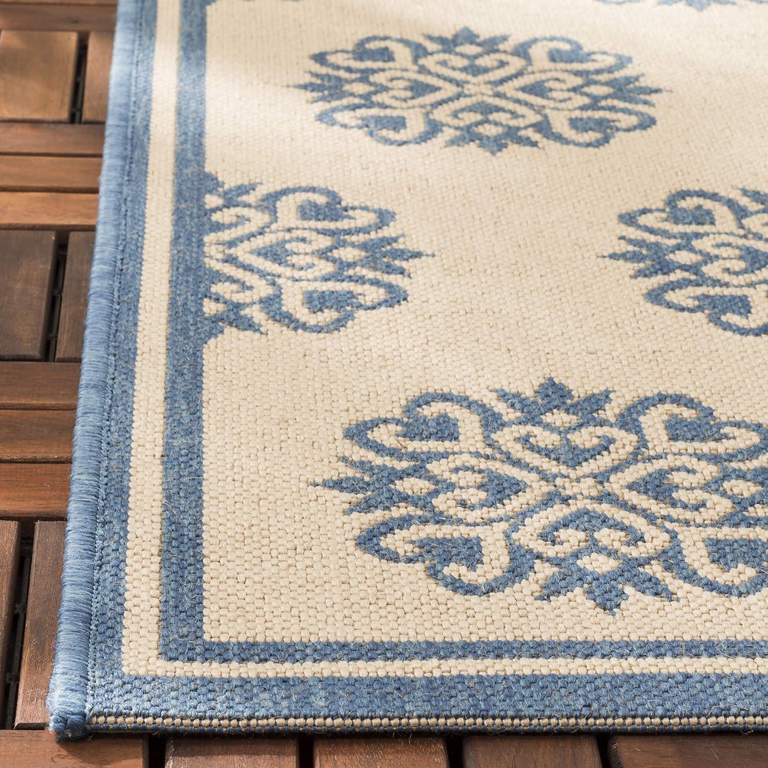 Cream and Blue Geometric Tufted 8' x 10' Synthetic Rug