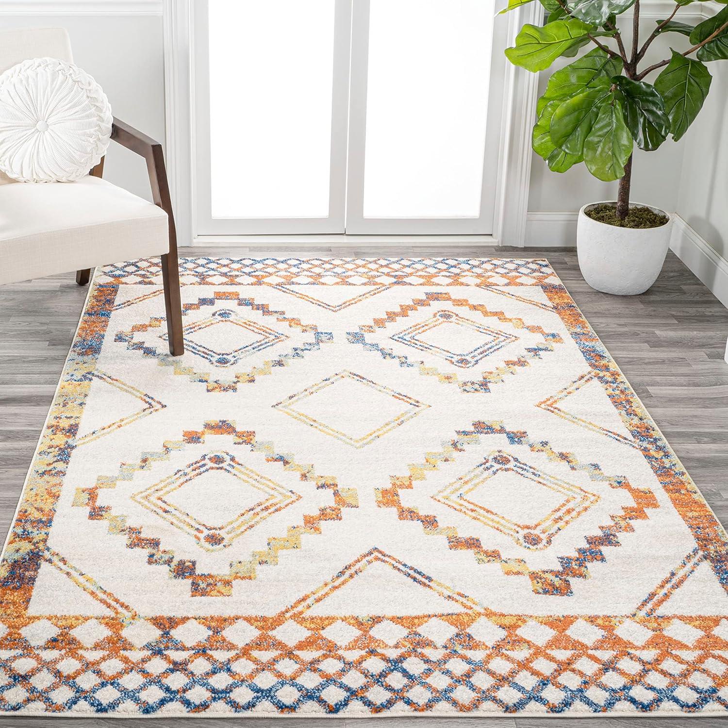 Ivory and Blue Geometric 8' x 10' Synthetic Area Rug