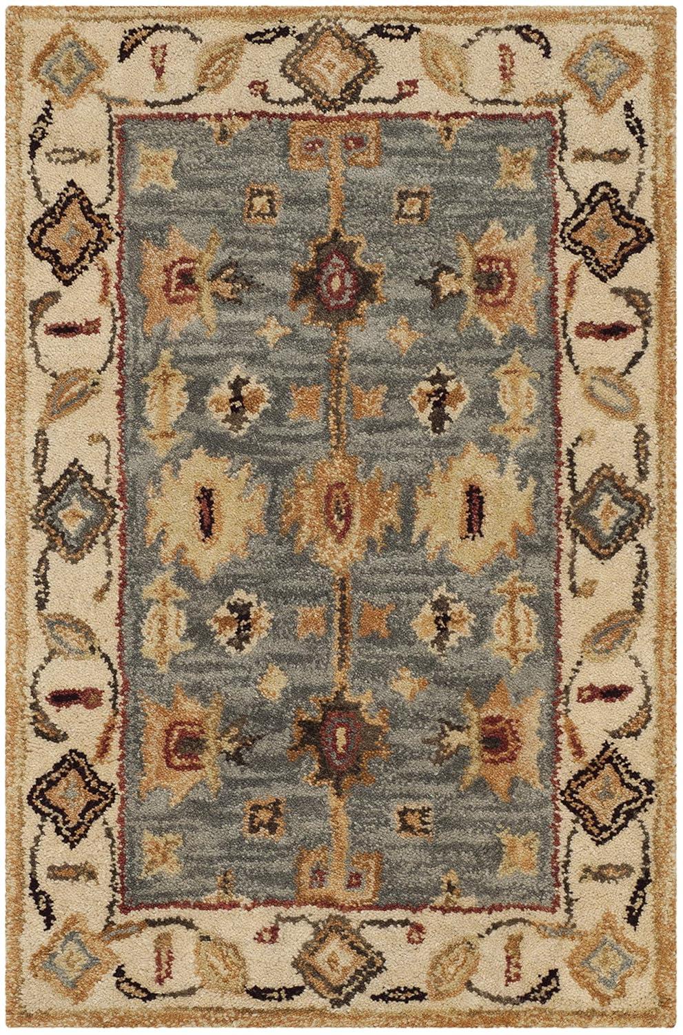 Antiquity AT847 Hand Tufted Area Rug - Blue/Ivory - 5'x8' - Safavieh.