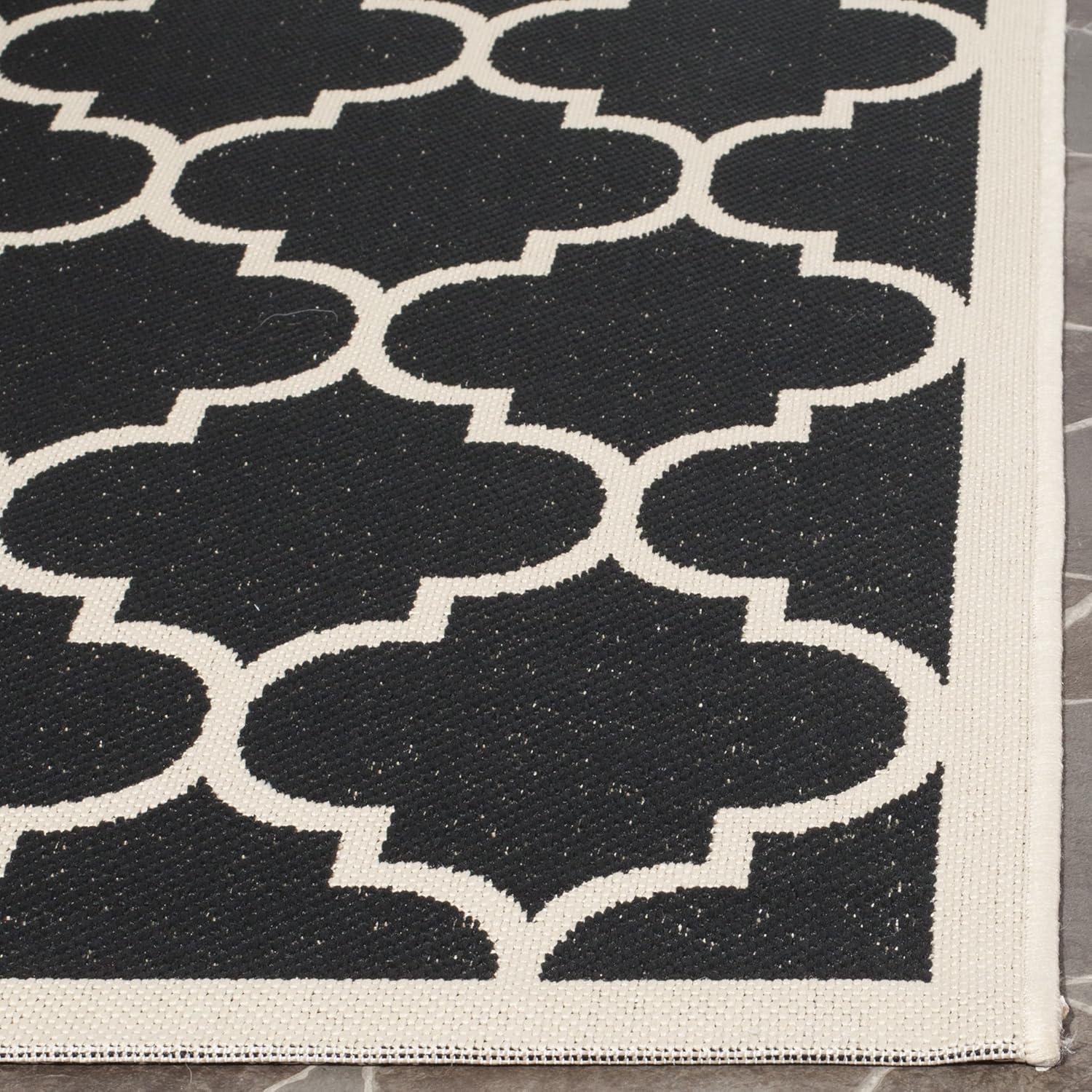 Black and Beige Synthetic Stain-Resistant Indoor/Outdoor Rug