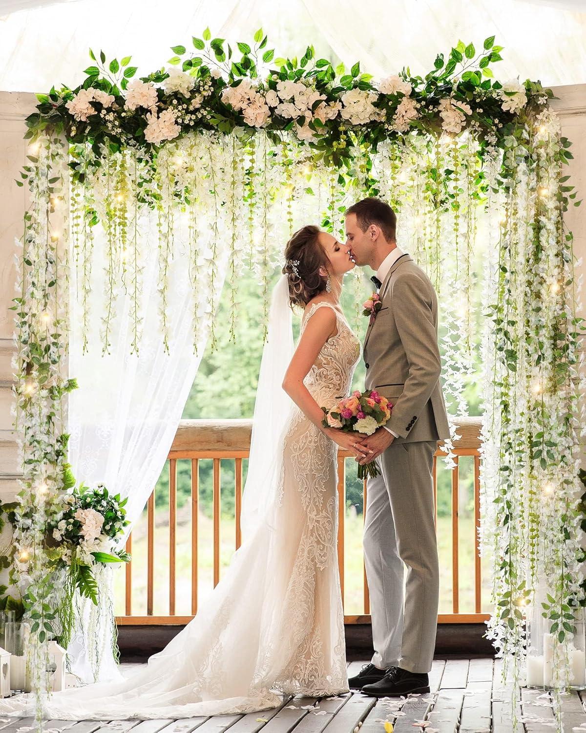 JACKYLED 40 Branches Wisteria Hanging Flowers 6 Feet Artificial White Vine Silk Wisteria Flowers Garland for Wedding Arch Party Garden Home Decor (4 Packs)