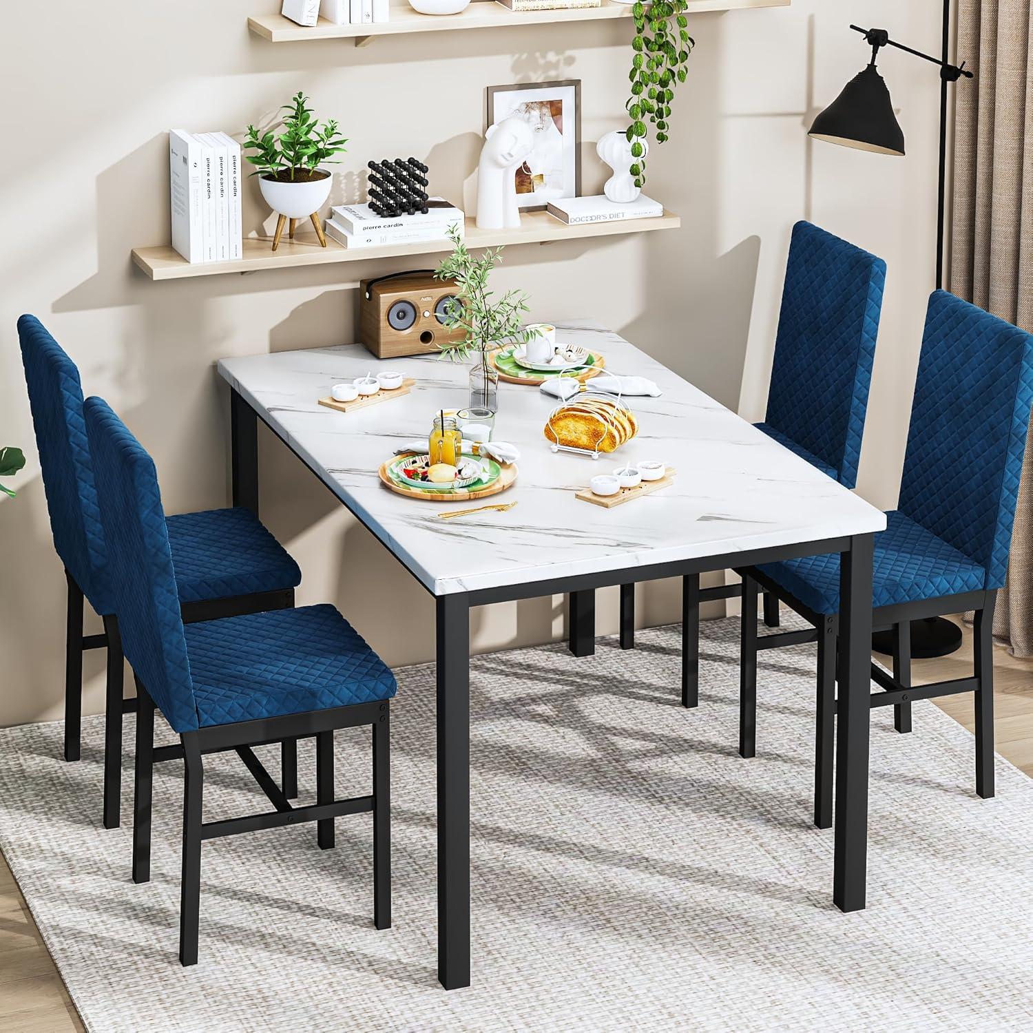 White Faux Marble Dining Table with Blue Velvet Chairs