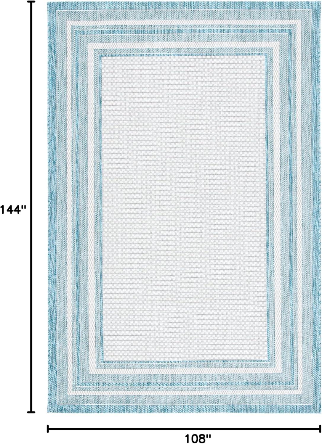 Ivory and Aqua Rectangular Reversible 9' x 12' Easy-Care Area Rug