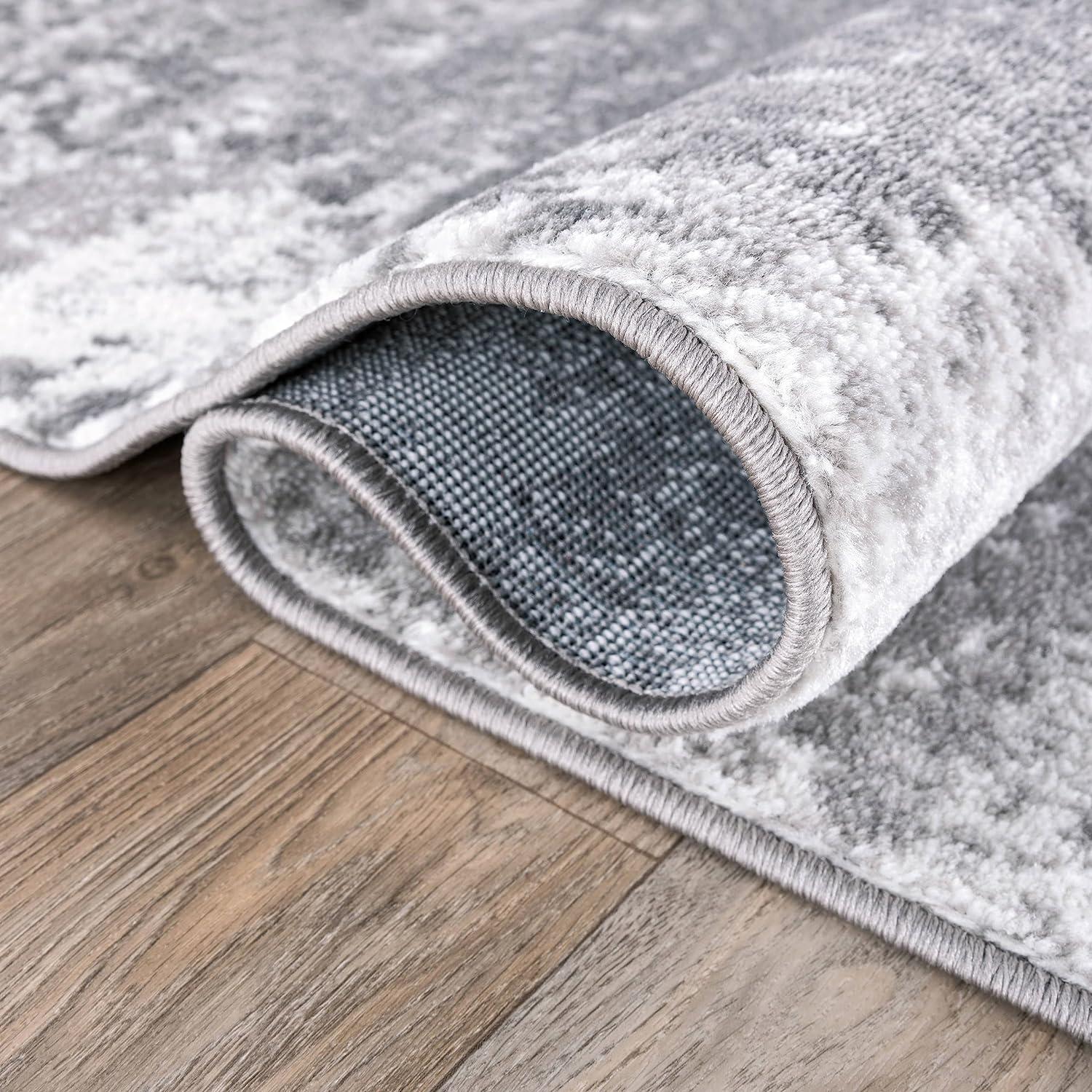 Reversible Distressed Abstract Gray 5' x 7' Synthetic Area Rug