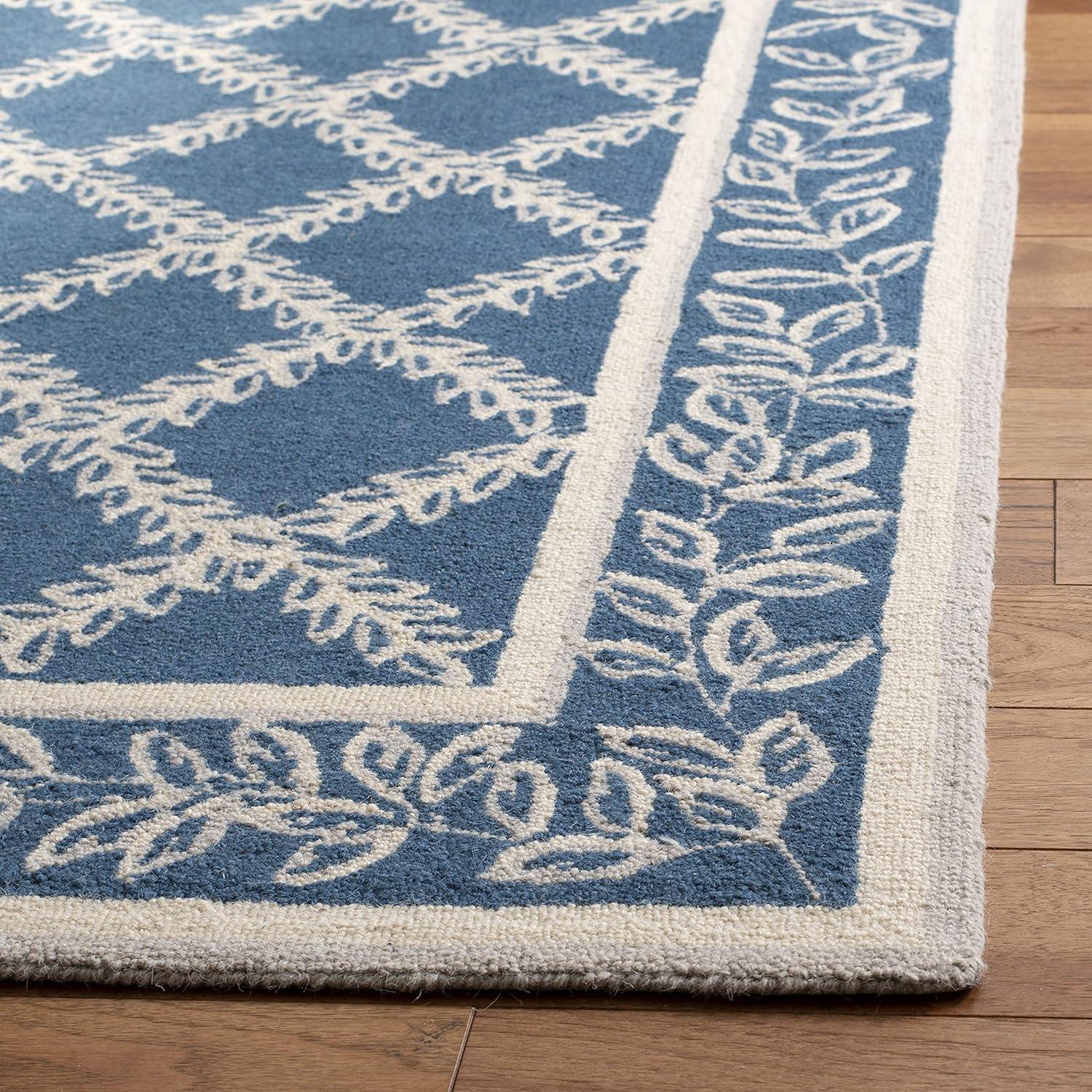 SAFAVIEH Chelsea Alecia Geometric Borders Wool Area Rug, Navy/Cream, 2'9" x 4'9"