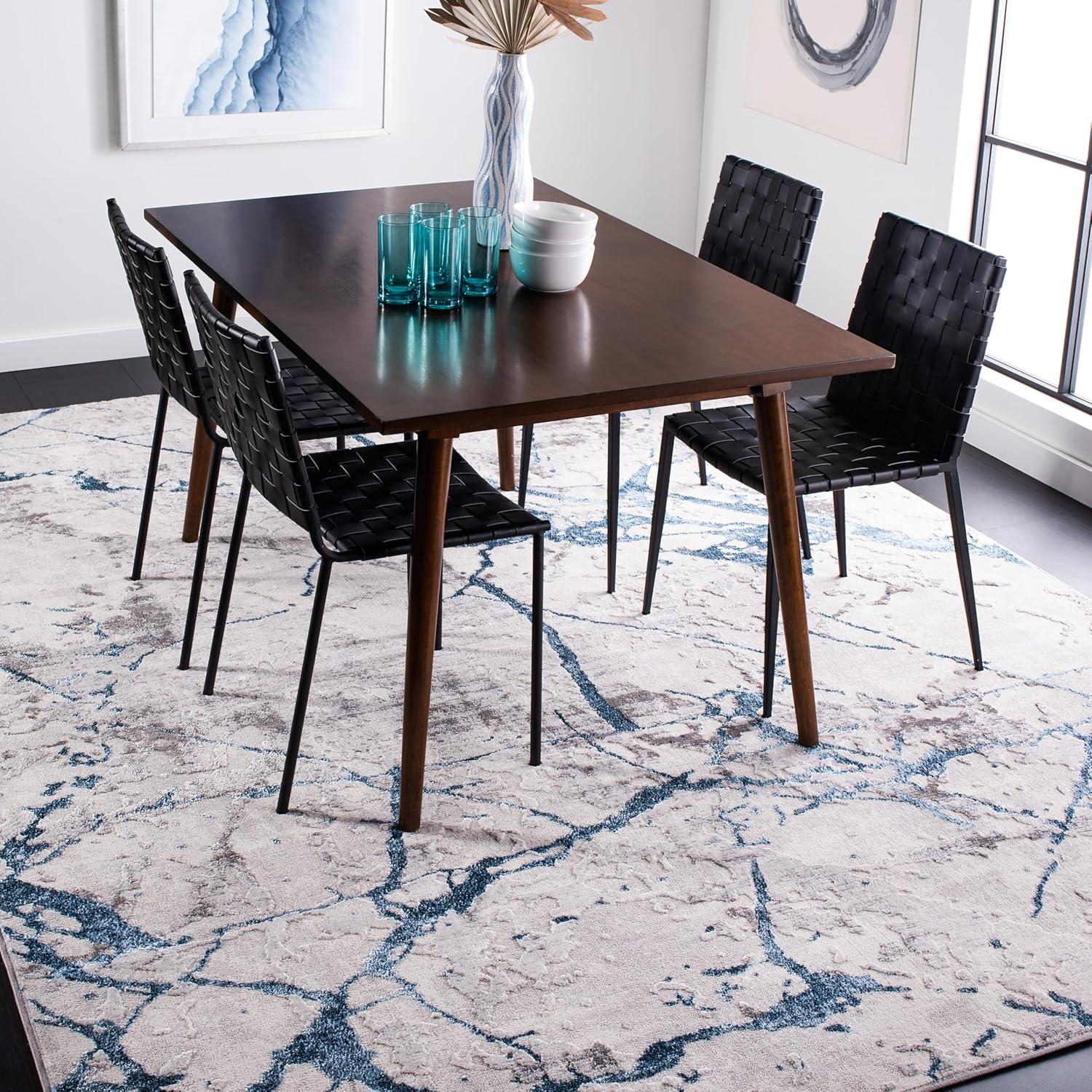 Grey and Blue Abstract Synthetic 9' x 12' Area Rug