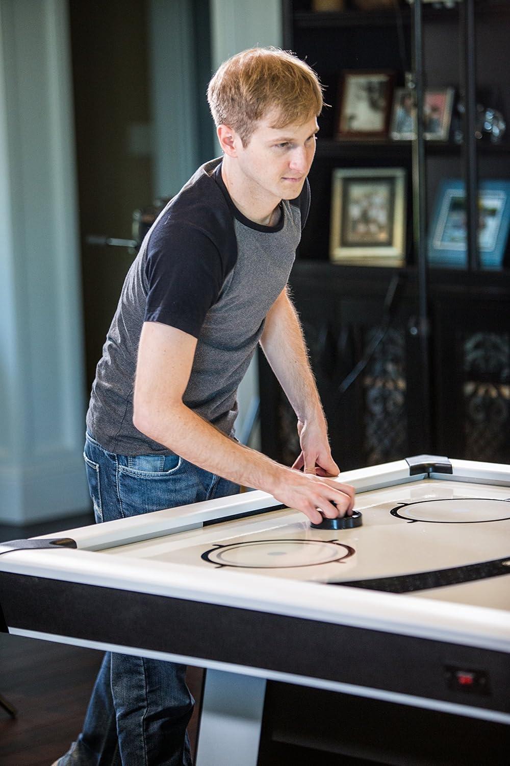 Atomic Blazer 7' Air Hockey Table with Heavy-Duty Blower, Electronic Scoring, Leg Levelers, and Overhang Rail