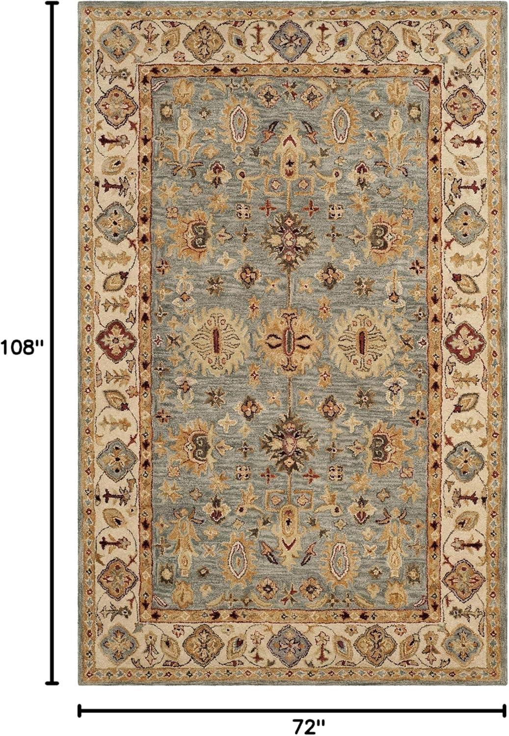 Antiquity AT847 Hand Tufted Area Rug - Blue/Ivory - 6'x9' - Safavieh.