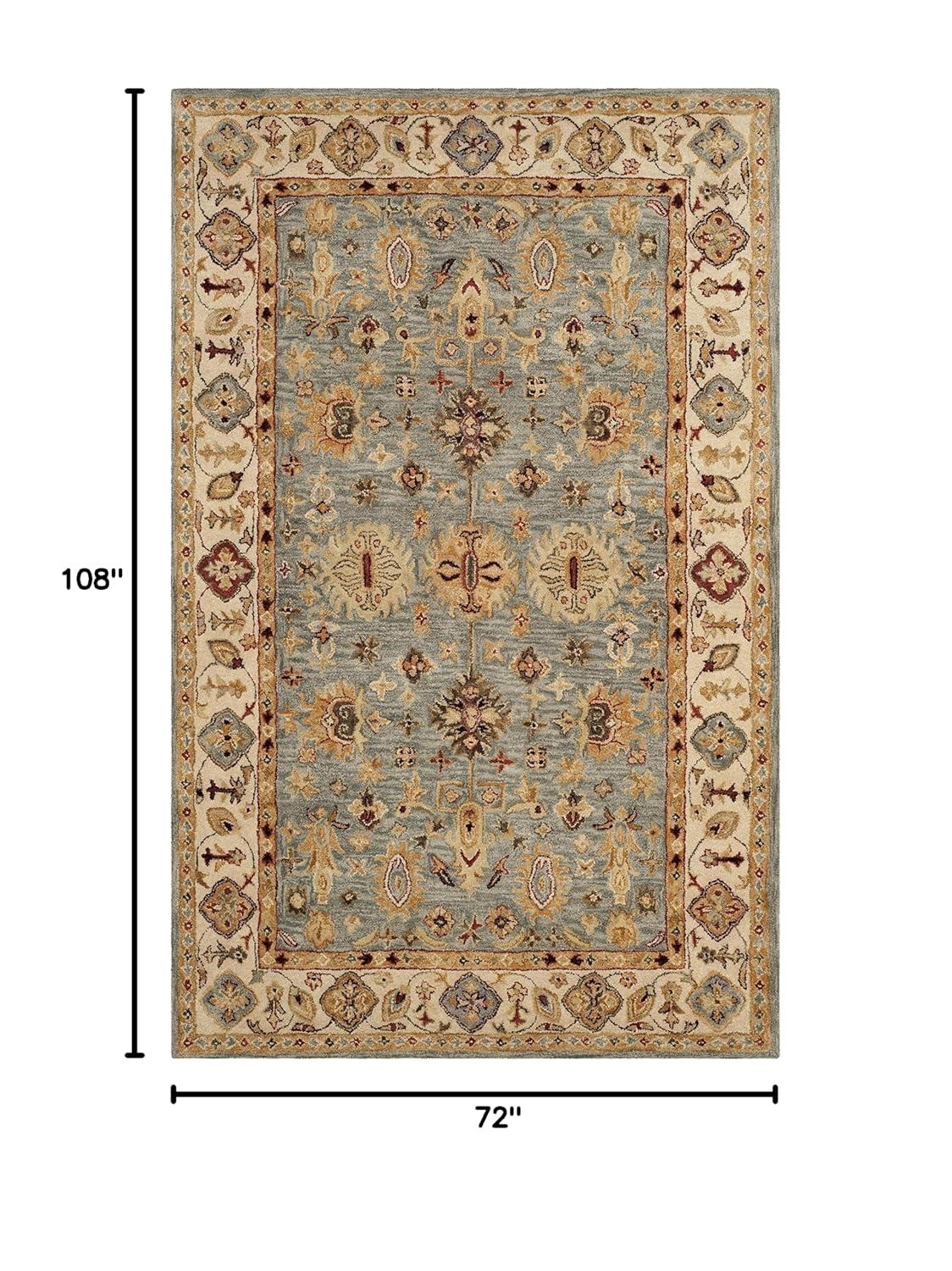 Antiquity AT847 Hand Tufted Area Rug - Blue/Ivory - 6'x9' - Safavieh.