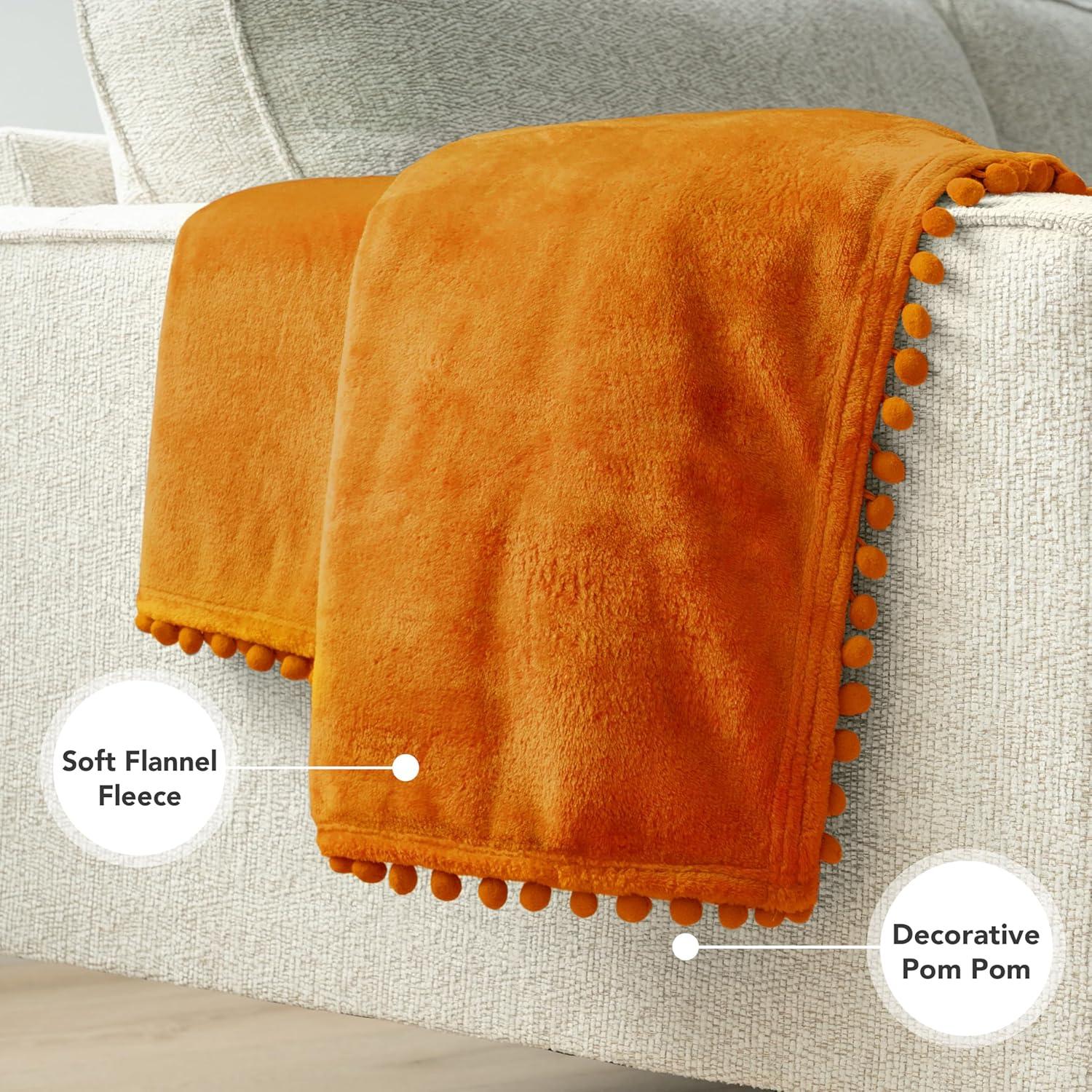 PAVILIA Fleece Pom Pom Blanket Throw for Sofa Bed, Soft Lightweight Pompom Fringe Blanket for Couch