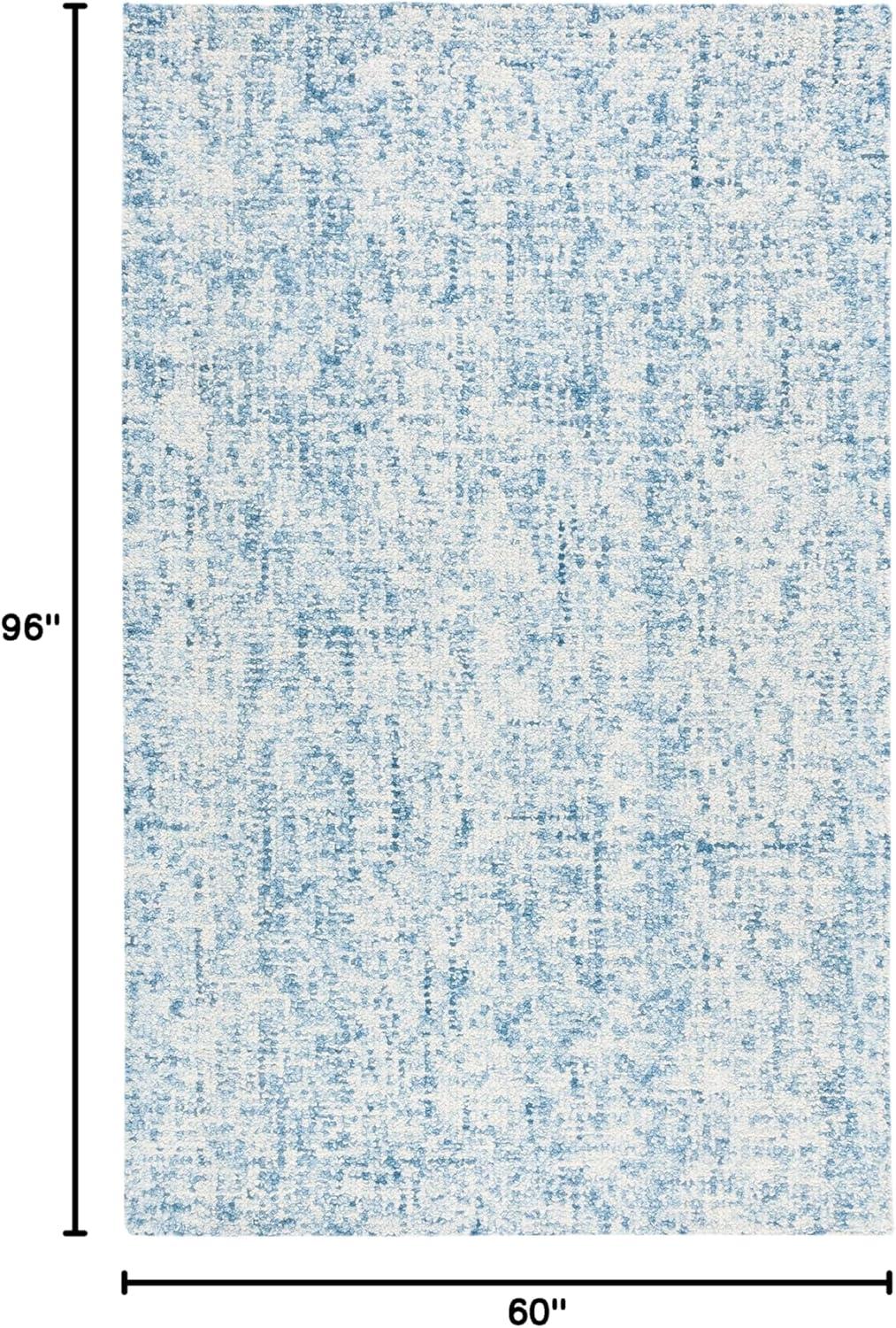 SAFAVIEH Abstract Ethelyn Solid Area Rug, Blue/Ivory, 5' x 8'