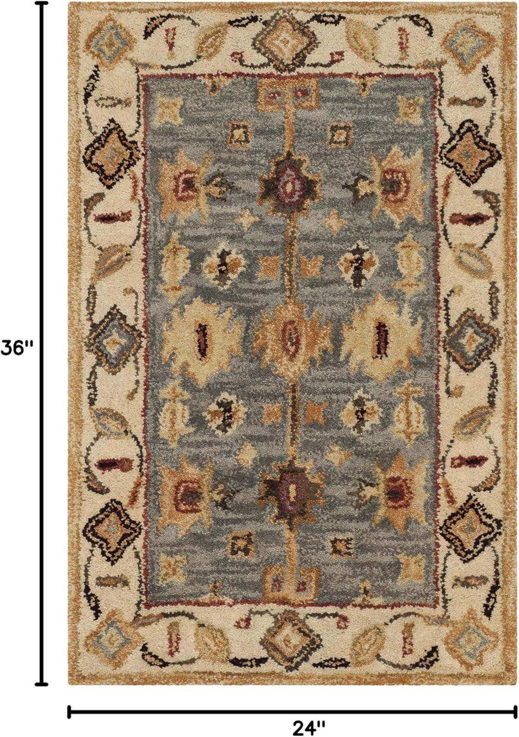 Antiquity AT847 Hand Tufted Area Rug - Blue/Ivory - 6'x9' - Safavieh.