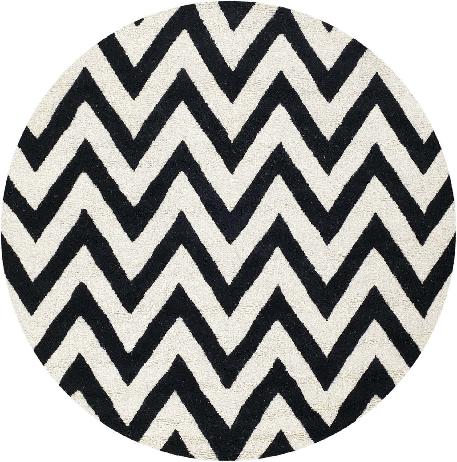 SAFAVIEH Cambridge Kaitlyn Zig Zag Stripes Wool Area Rug, Black/Ivory, 4' x 4' Round