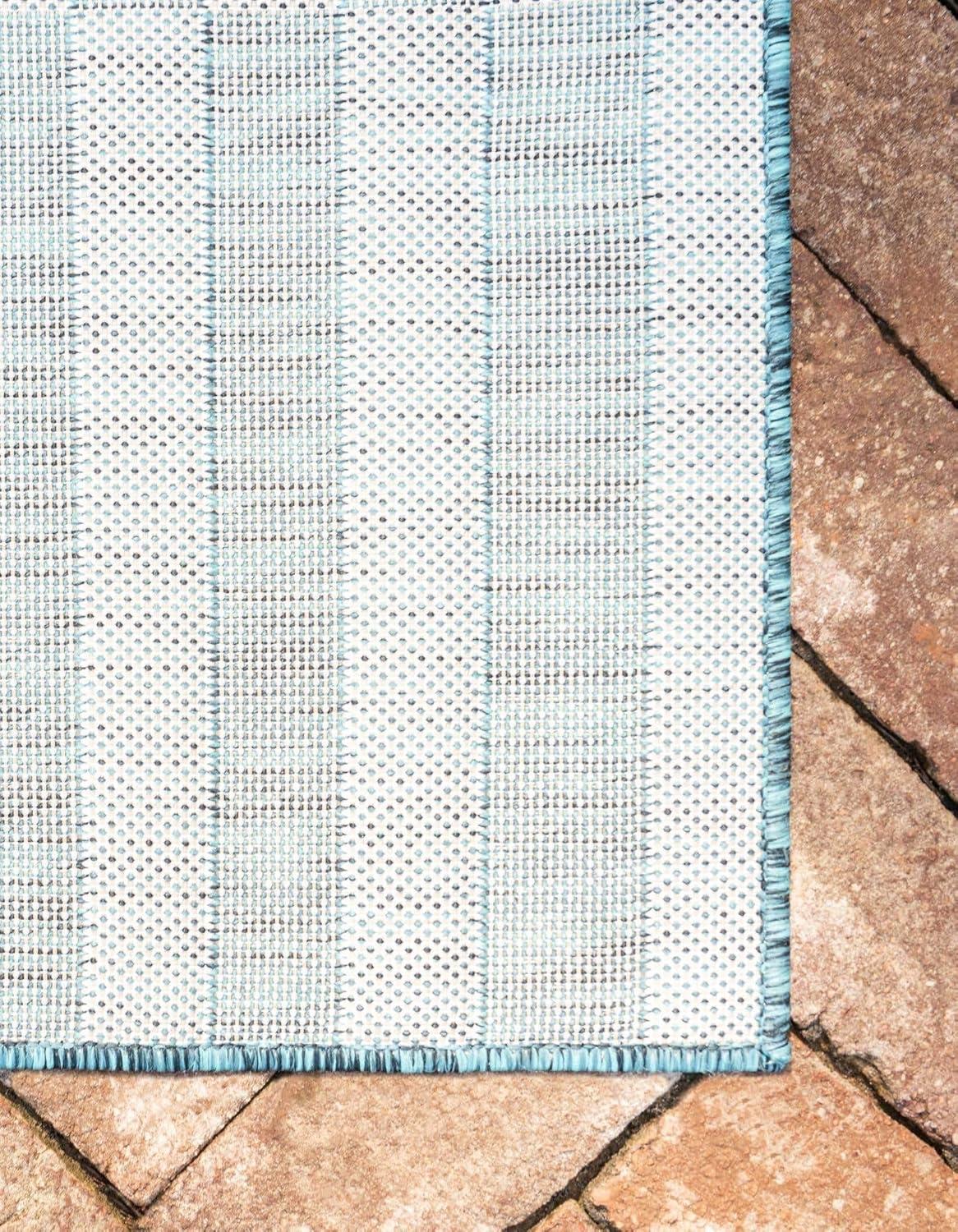 Teal and Ivory Stripe Easy-Care Outdoor Rug 5'1" x 8' Rectangular Synthetic