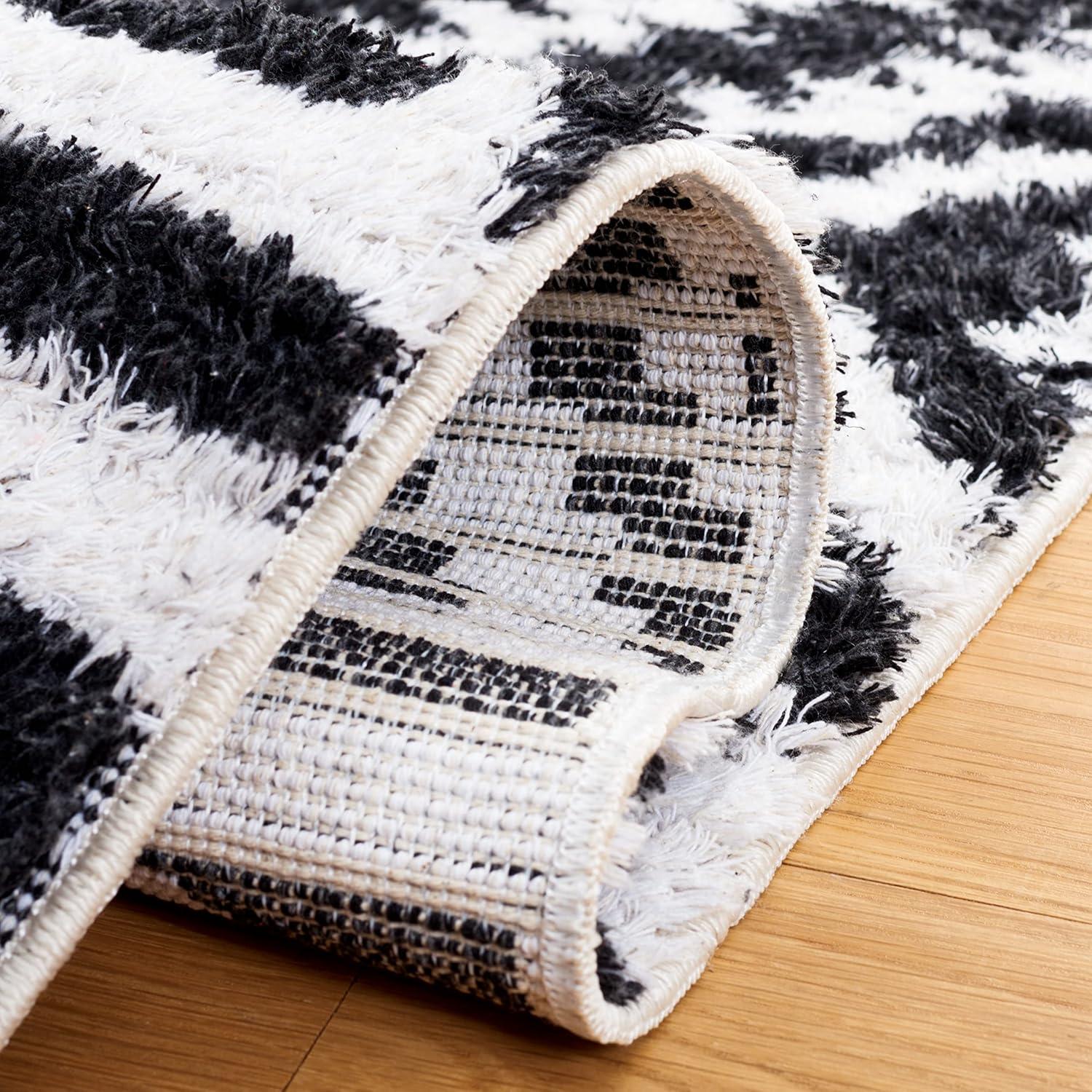Augustine AGT849 Machine Made Indoor Area Rug - Black/Ivory - 6'-4"x9'-6" - Safavieh