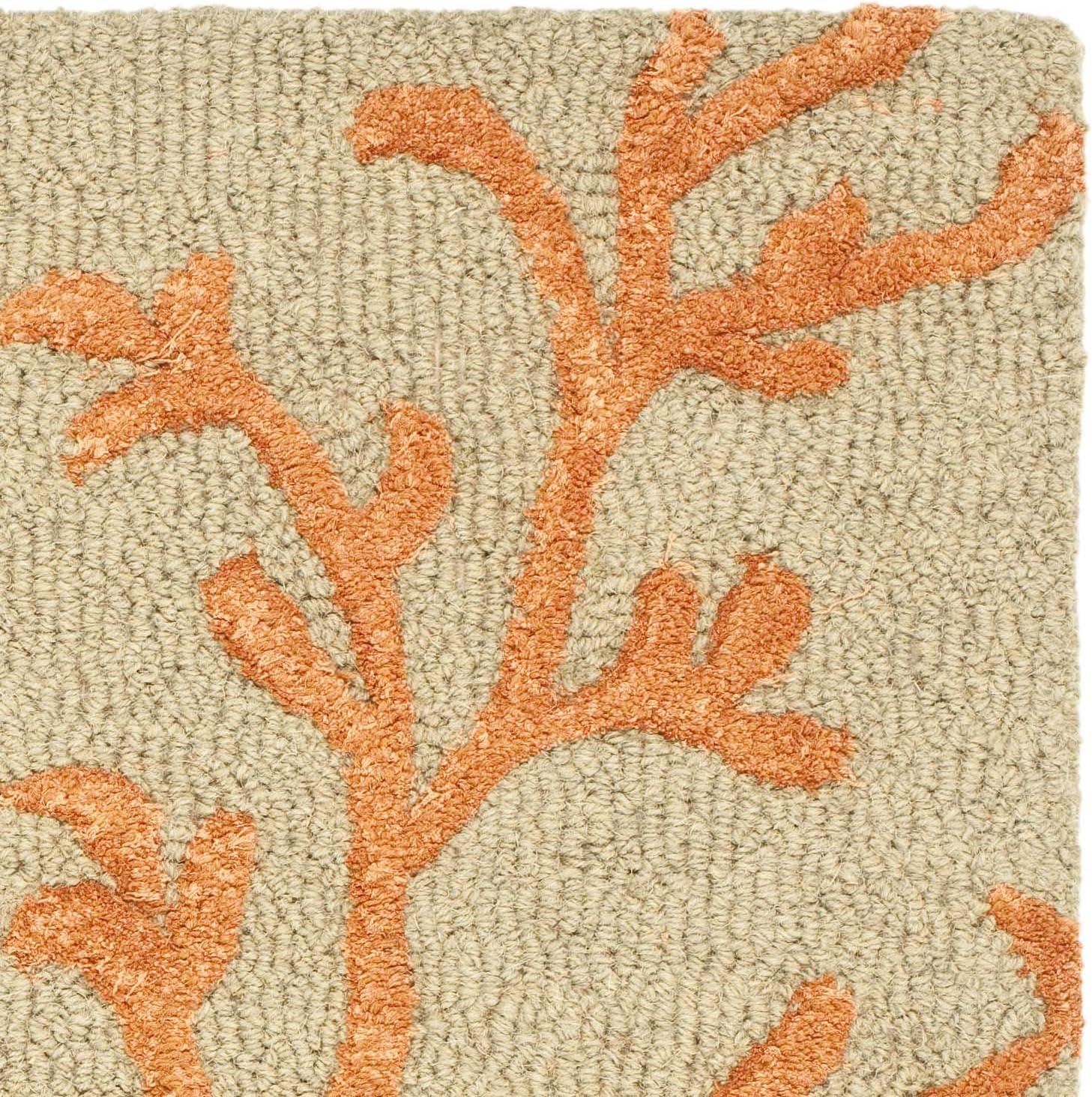 Handmade Brown and Light Blue Floral Wool Rug