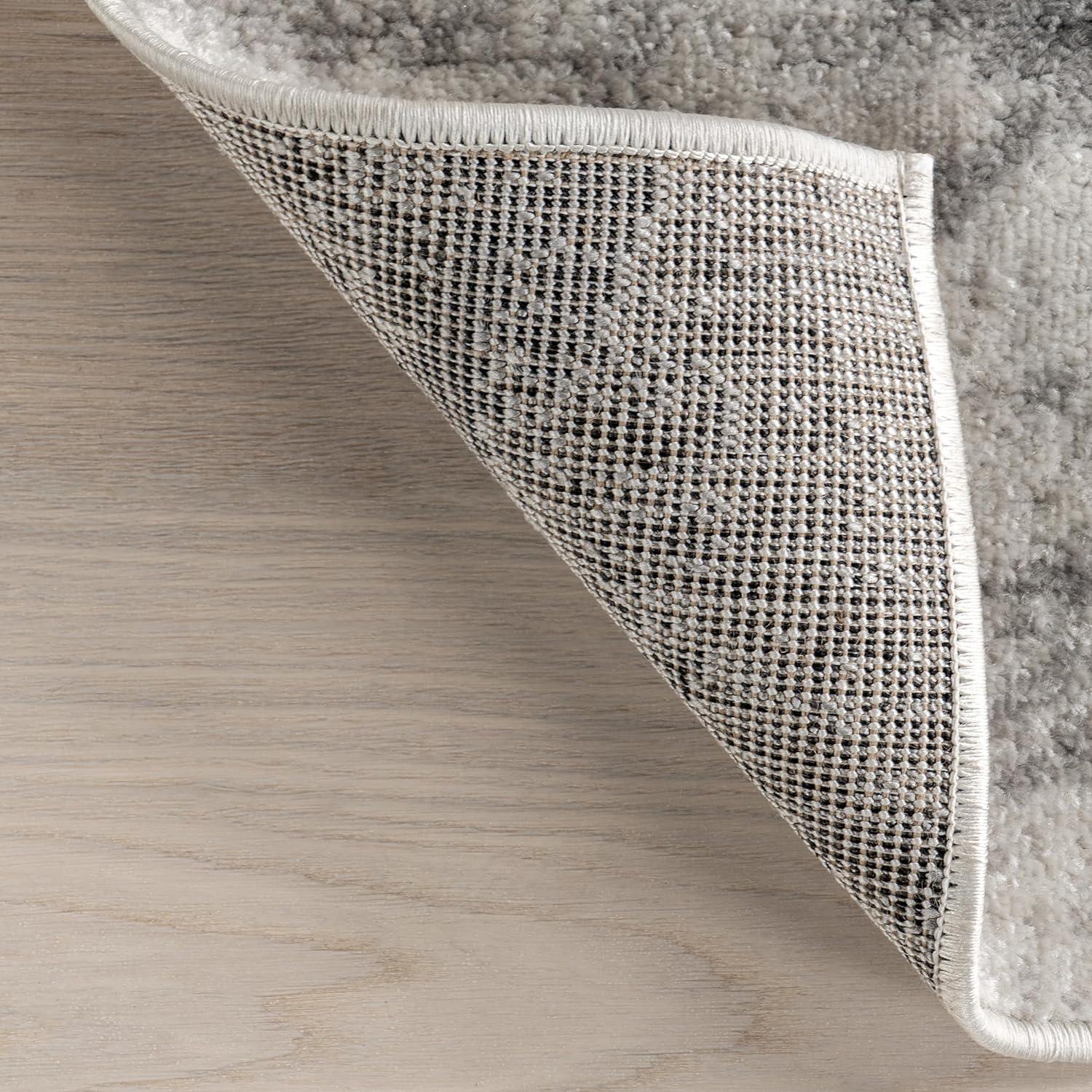 Gray Oval Reversible Stain-Resistant Synthetic Area Rug