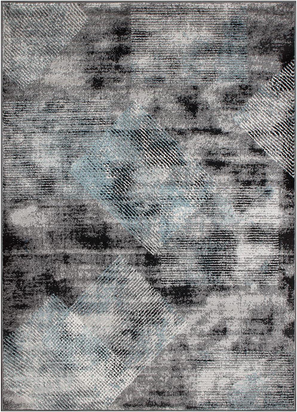 Reversible Geometric Black Synthetic 5' x 7' Area Rug