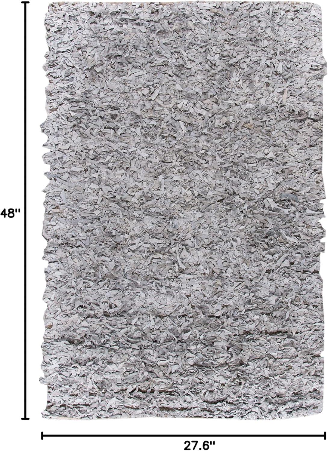 SAFAVIEH Mariam Leather Shag Area Rug, White, 2'3" x 4'