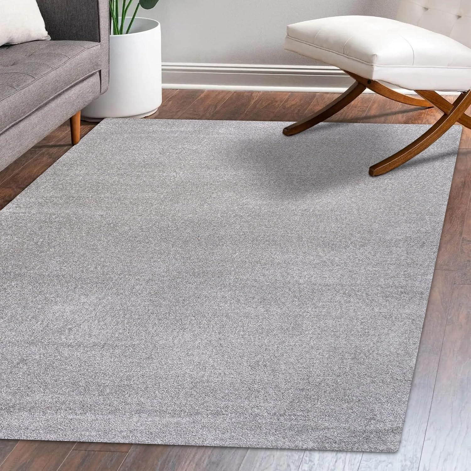 5'x8' Haze Solid Low-Pile Area Rug, Light Gray - JONATHAN Y