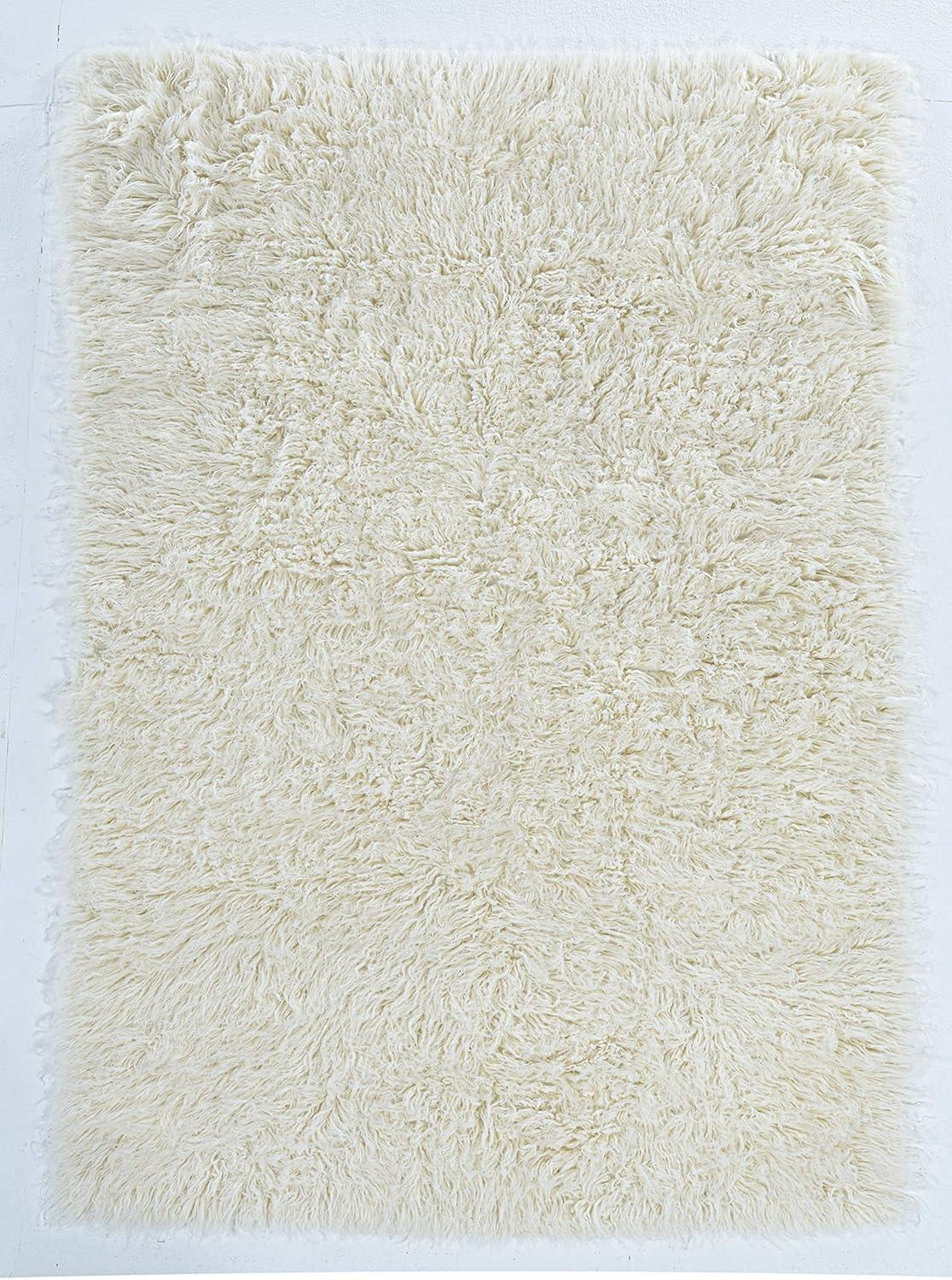 Ebern Designs Aaiden Flokati Wool Shag Hand Loomed Ivory Rug