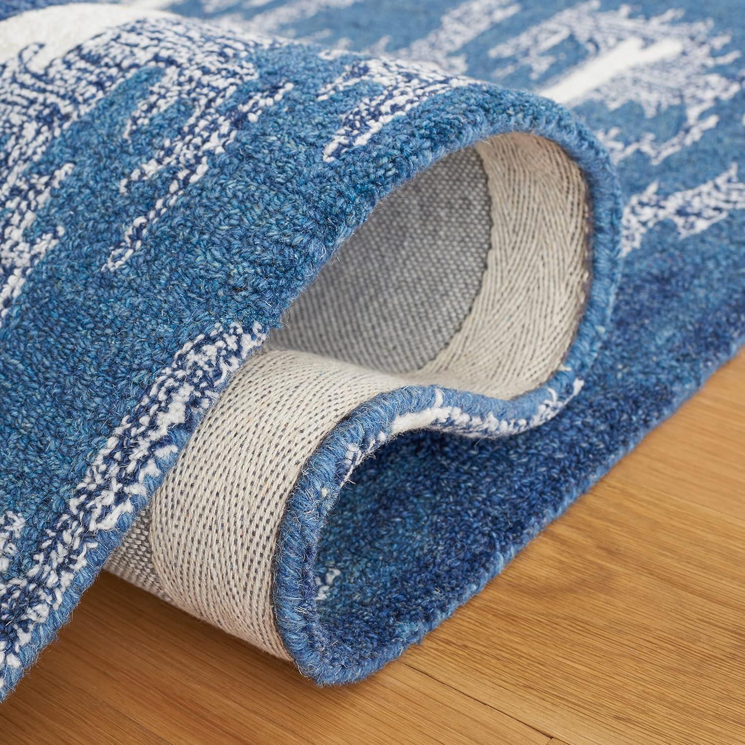 Ikat IKT652 Hand Tufted Area Rug - Blue/Ivory - 8'x10' - Safavieh.