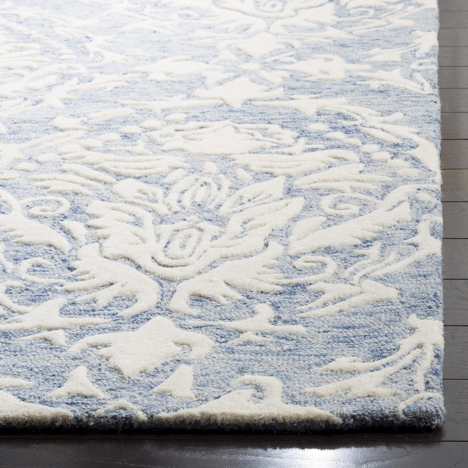 Handmade Floral Bliss Blue/Ivory Wool 5' x 8' Tufted Area Rug