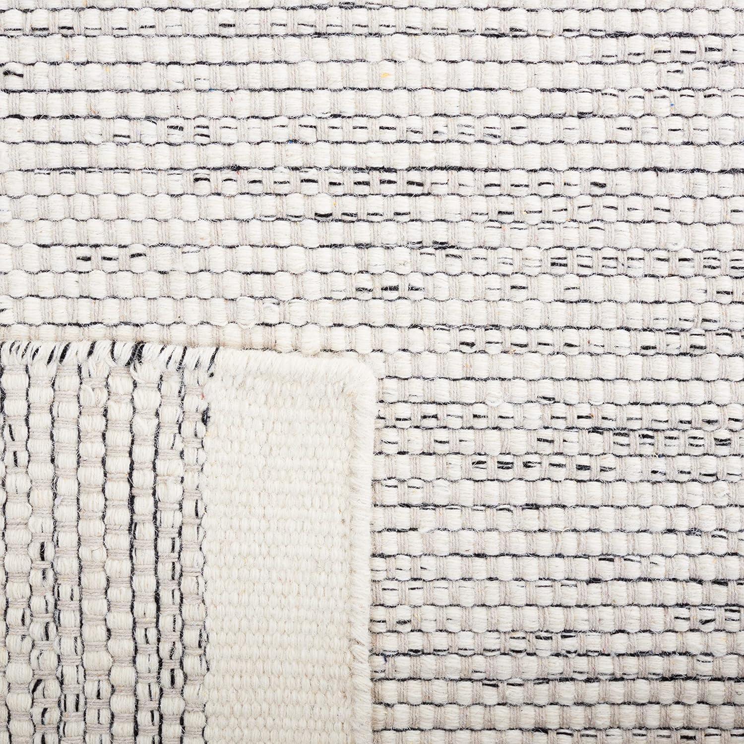 Ivory and Black Flat Woven Wool Area Rug, 4' x 6'