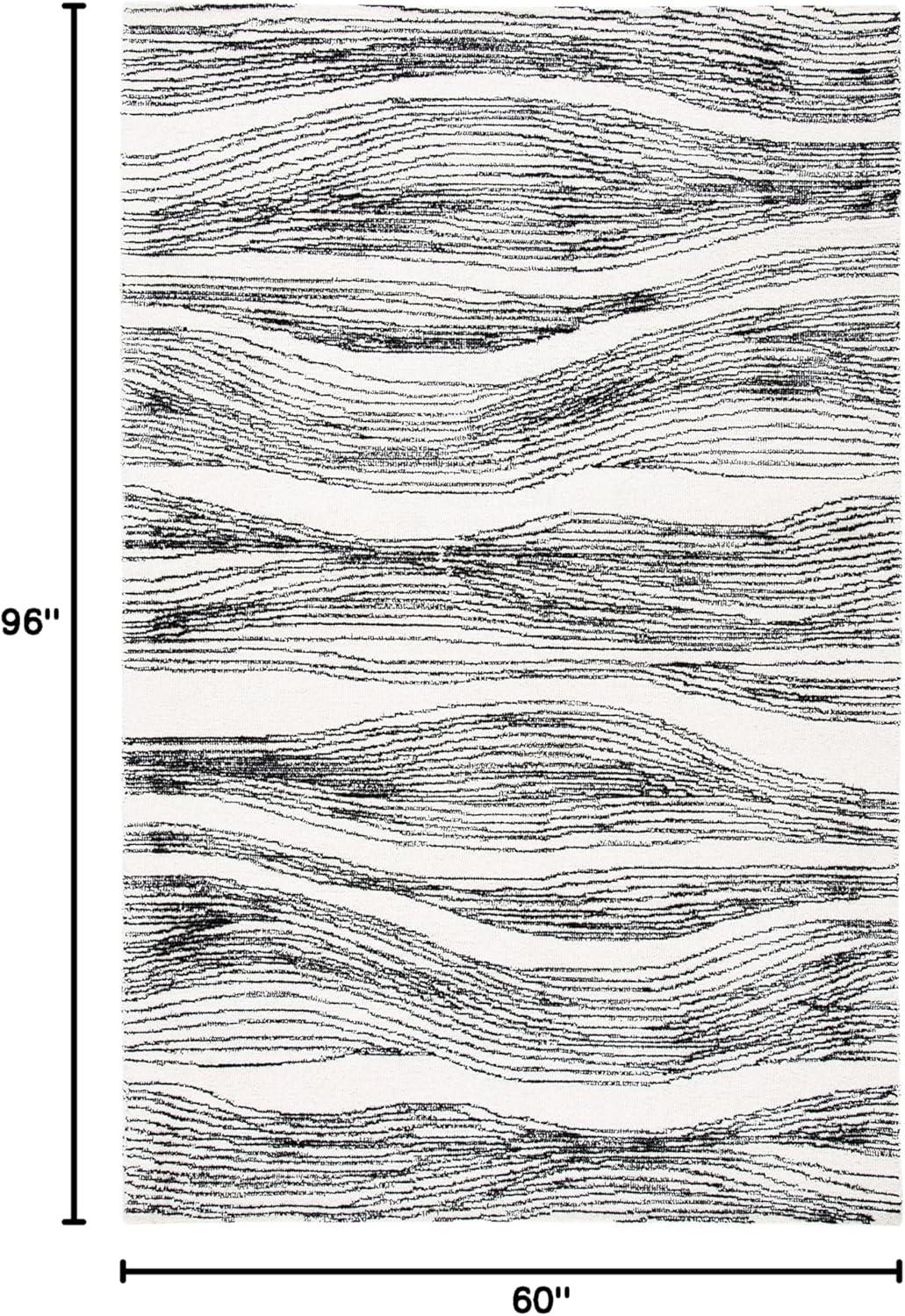 Metro MET995 Hand Tufted Indoor Area Rug - Black/Ivory - 5'x8' - Safavieh