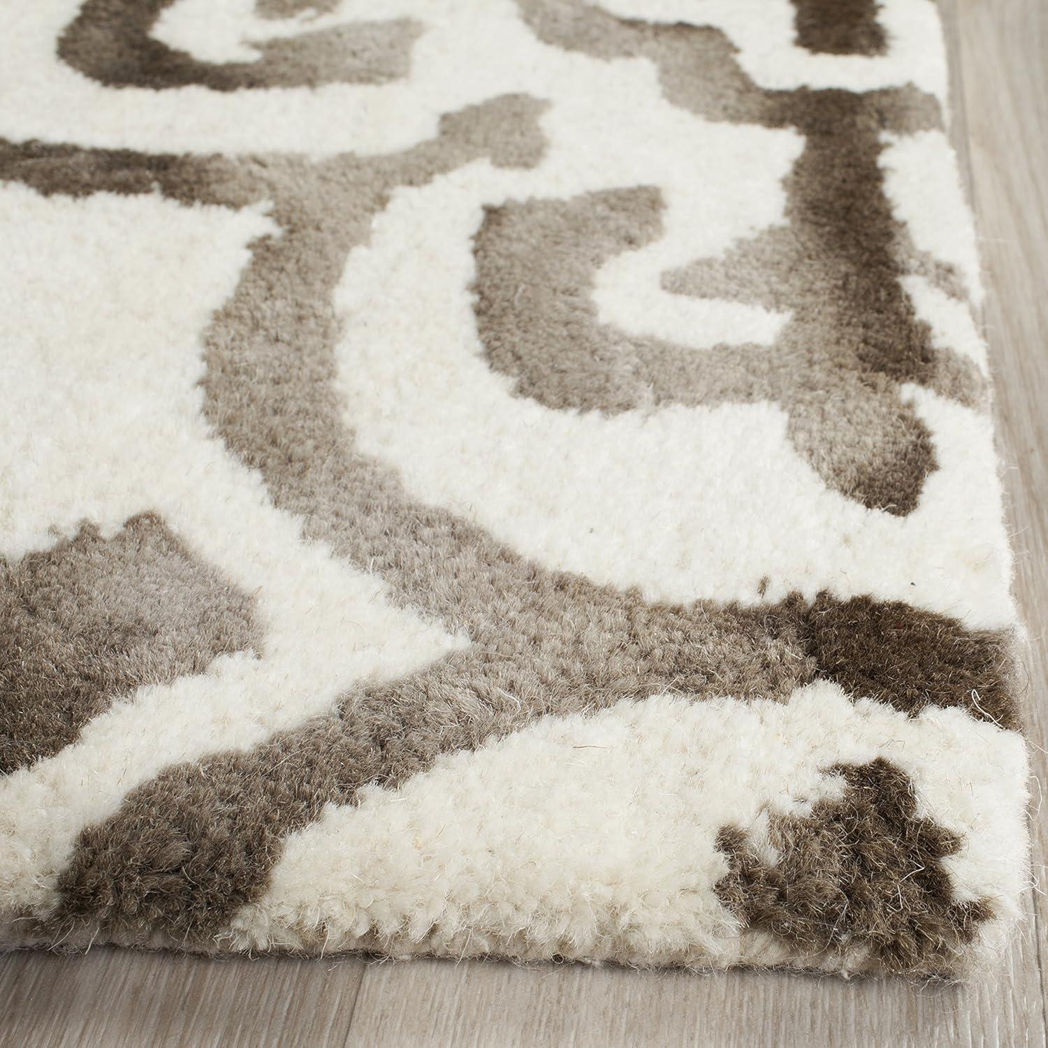 Ivory and Brown 9' x 12' Hand-Tufted Wool Area Rug