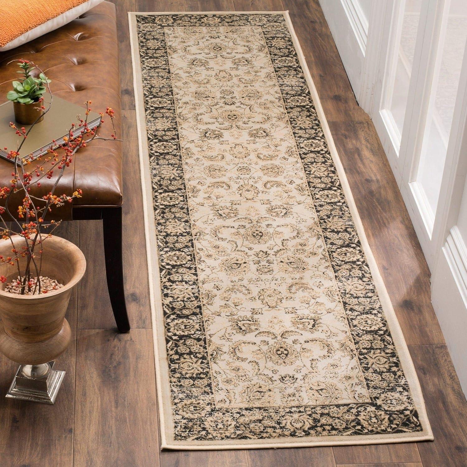 SAFAVIEH Vintage Jessamine Traditional Area Rug, Ivory/Black, 6'7" x 9'2"