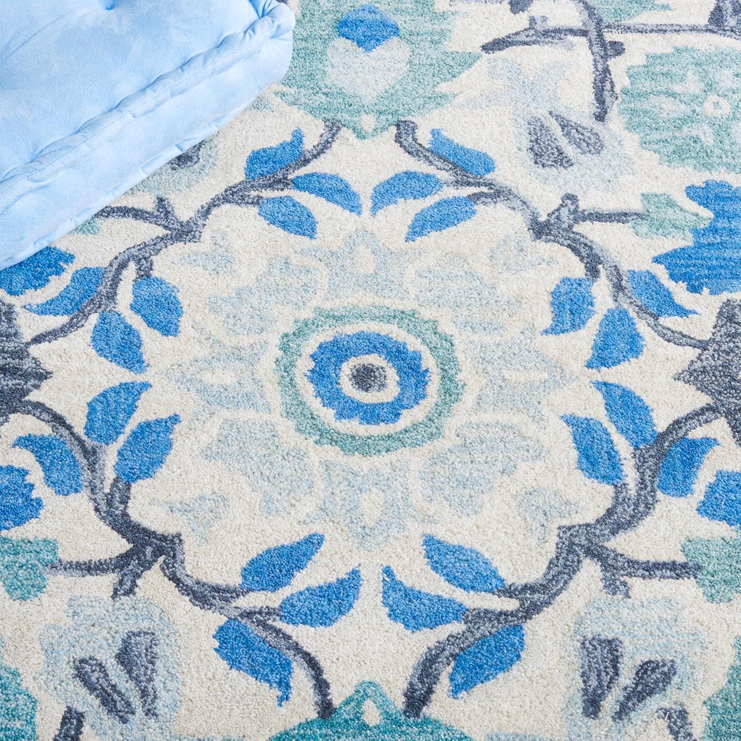 Antiquity AT59 Hand Tufted Area Rug - Ivory/Blue - 5'x8' - Safavieh.