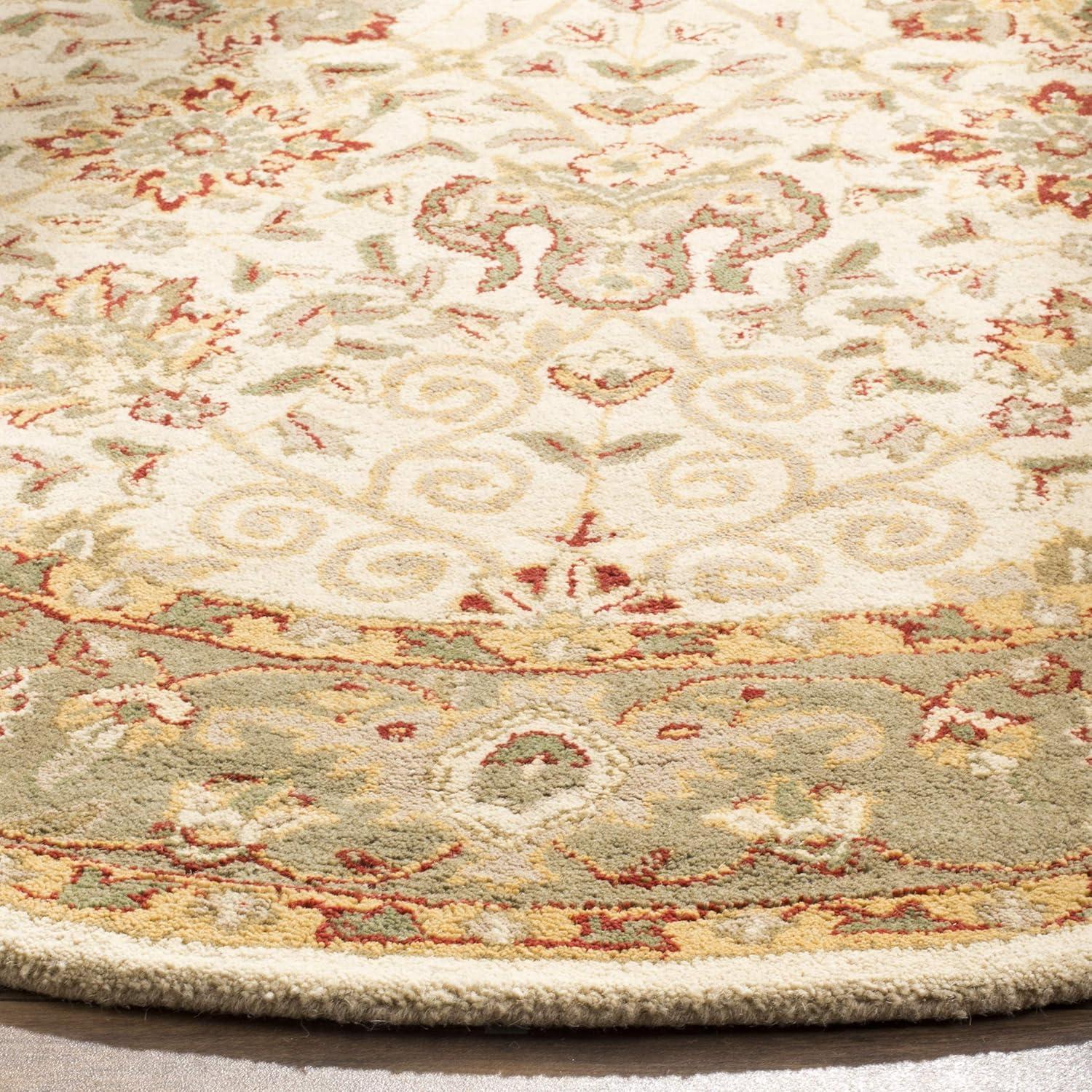 SAFAVIEH Antiquity Lilibeth Traditional Floral Wool Area Rug, Ivory, 4'6" x 6'6" Oval