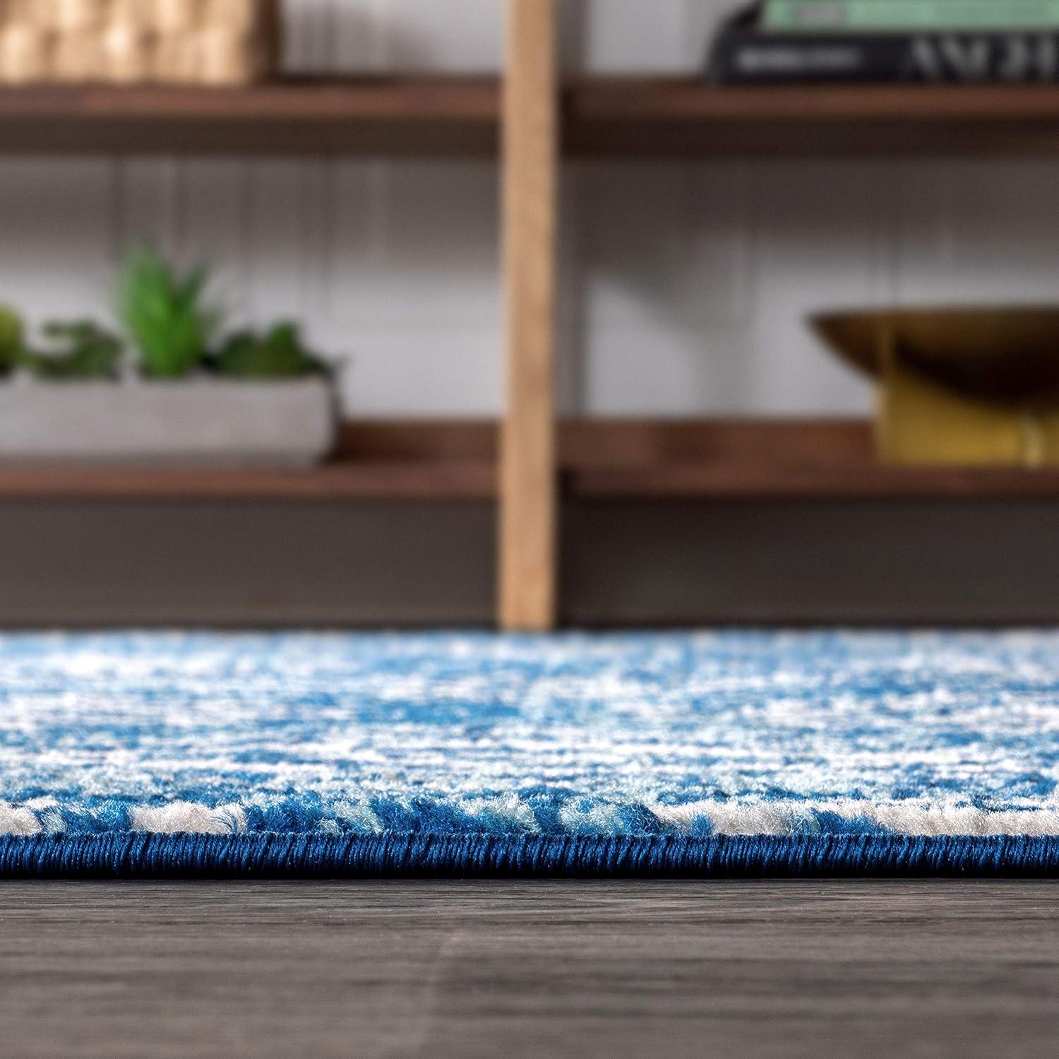 Blue and White 4' x 6' Synthetic Moroccan Area Rug