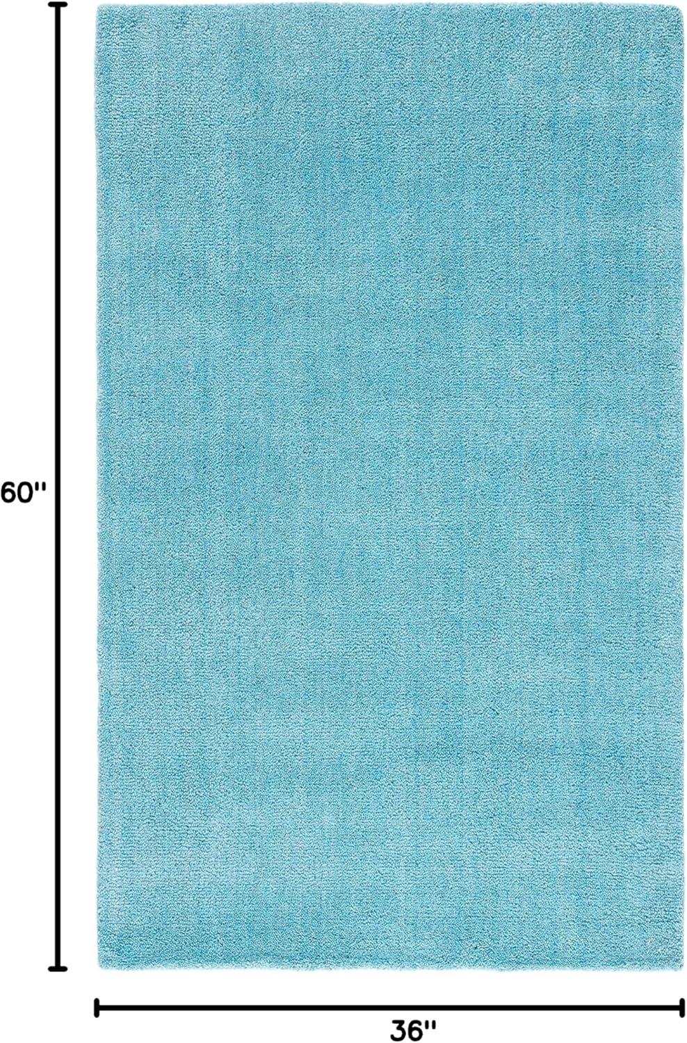 Moreau Handmade Tufted Wool Turquoise Area Rug