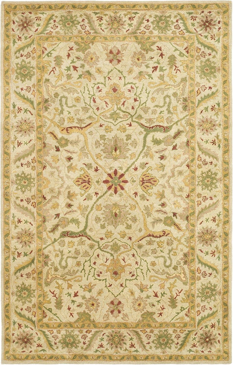 Ivory Tufted Handmade Wool 6' x 9' Rectangular Area Rug