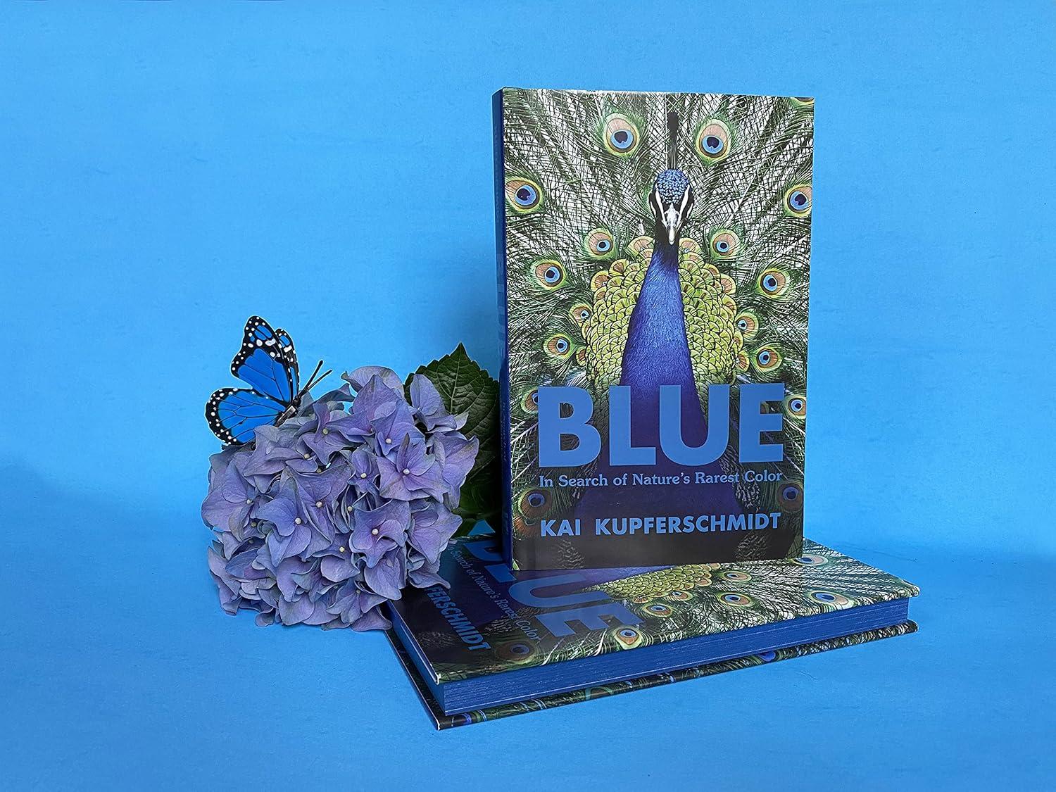Blue: The Science and Secrets of Nature’s Rarest Color Paperback Book