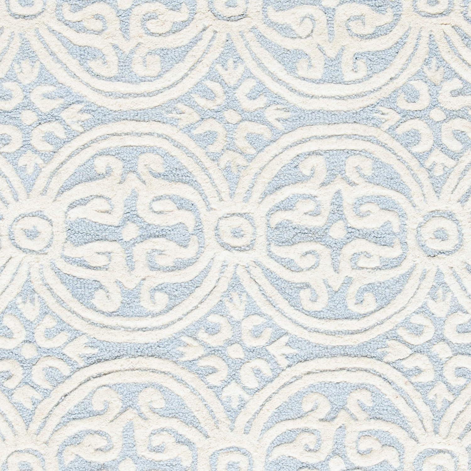 SAFAVIEH Cambridge Leslie Geometric Wool Area Rug, Light Blue/Ivory, 11' x 15'