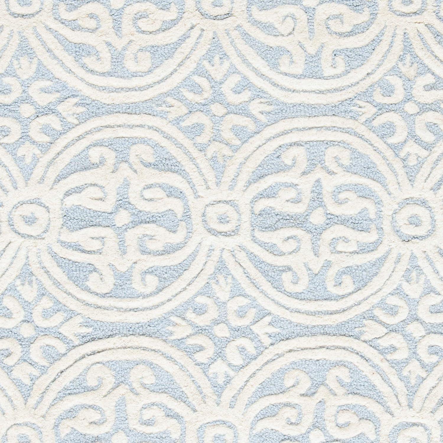 SAFAVIEH Cambridge Leslie Geometric Wool Area Rug, Light Blue/Ivory, 11' x 15'