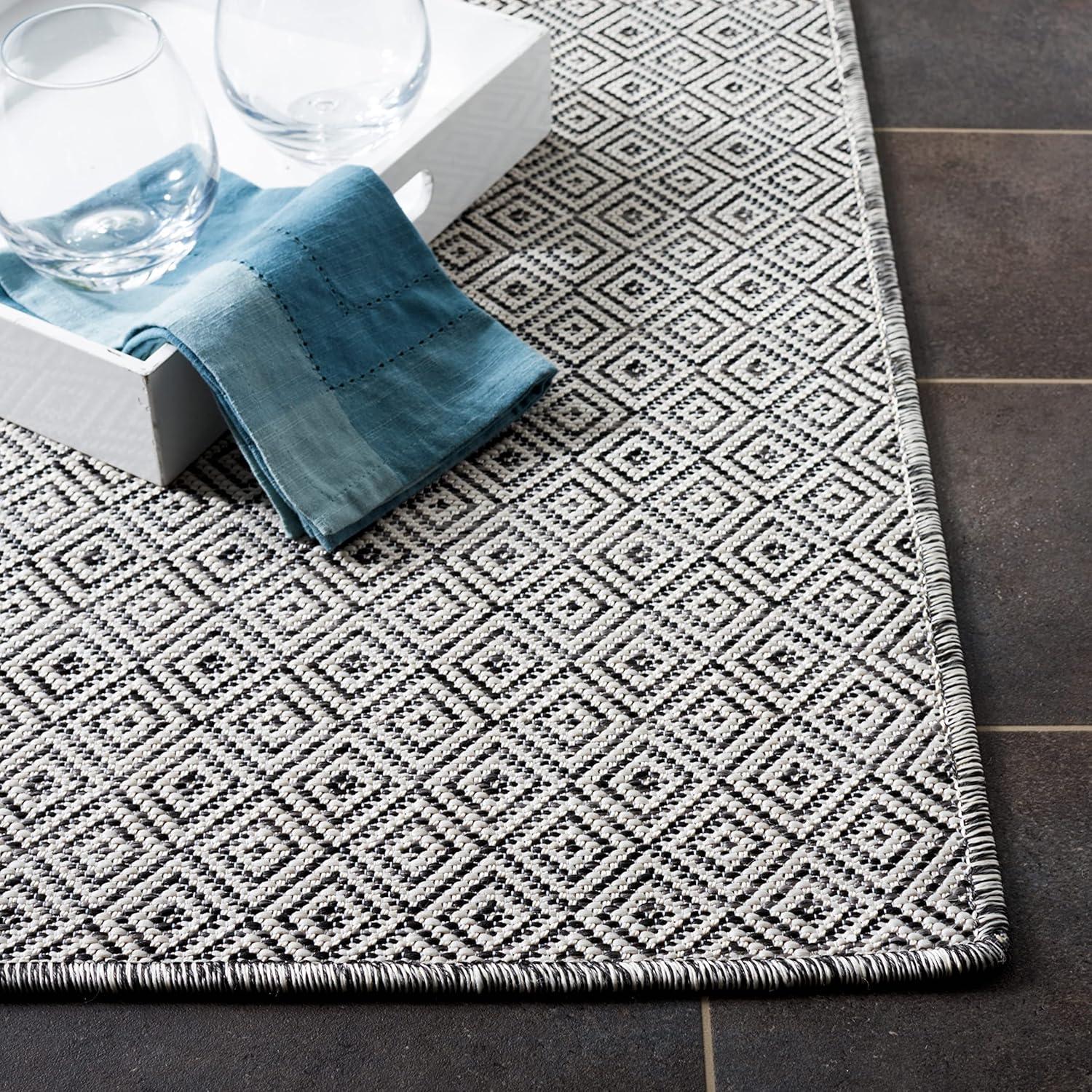 Hampton HTN230 Power Loomed Indoor/Outdoor Area Rug - Ivory/Black - 8'x10' - Safavieh.