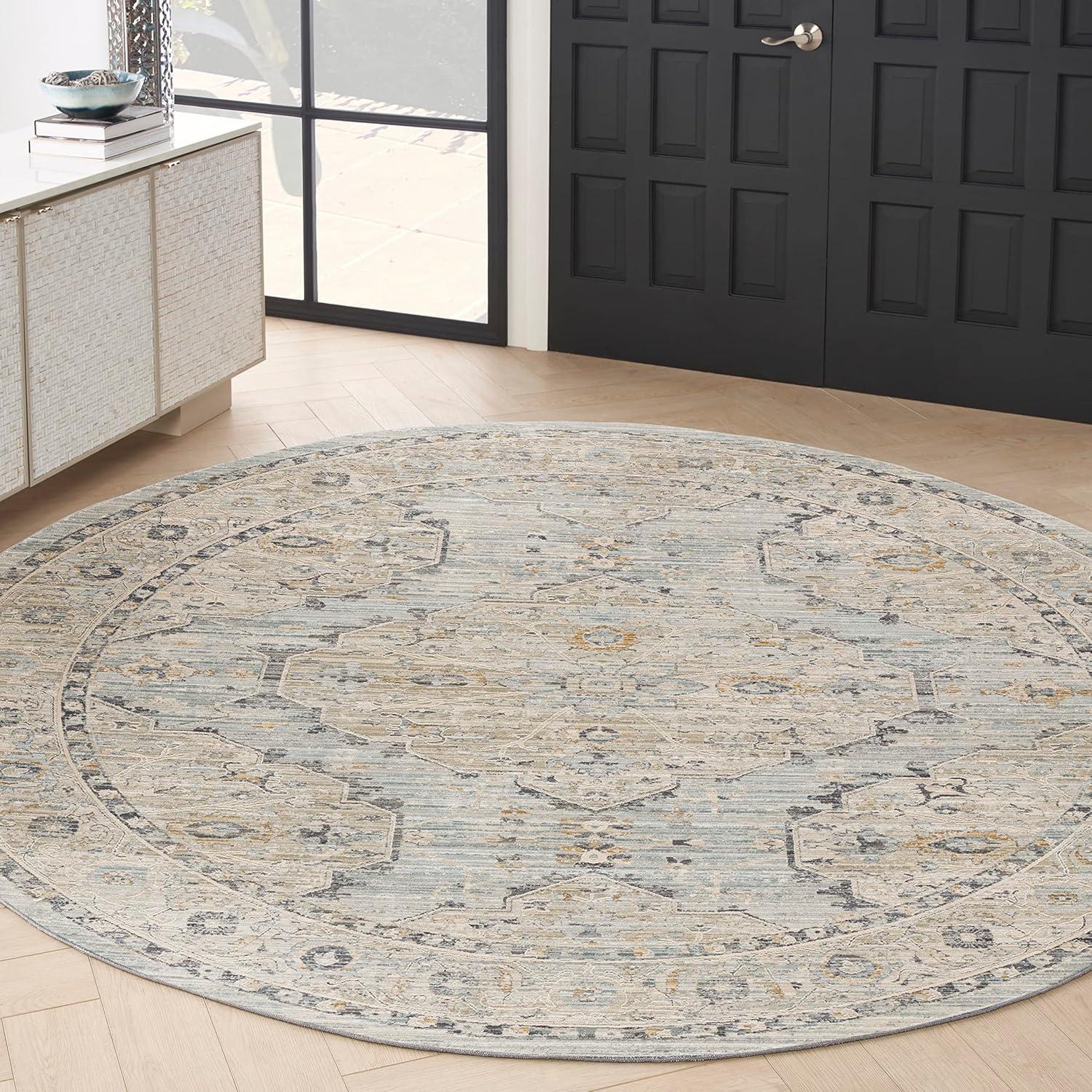 Nyle Light Blue and Beige Round Synthetic Area Rug